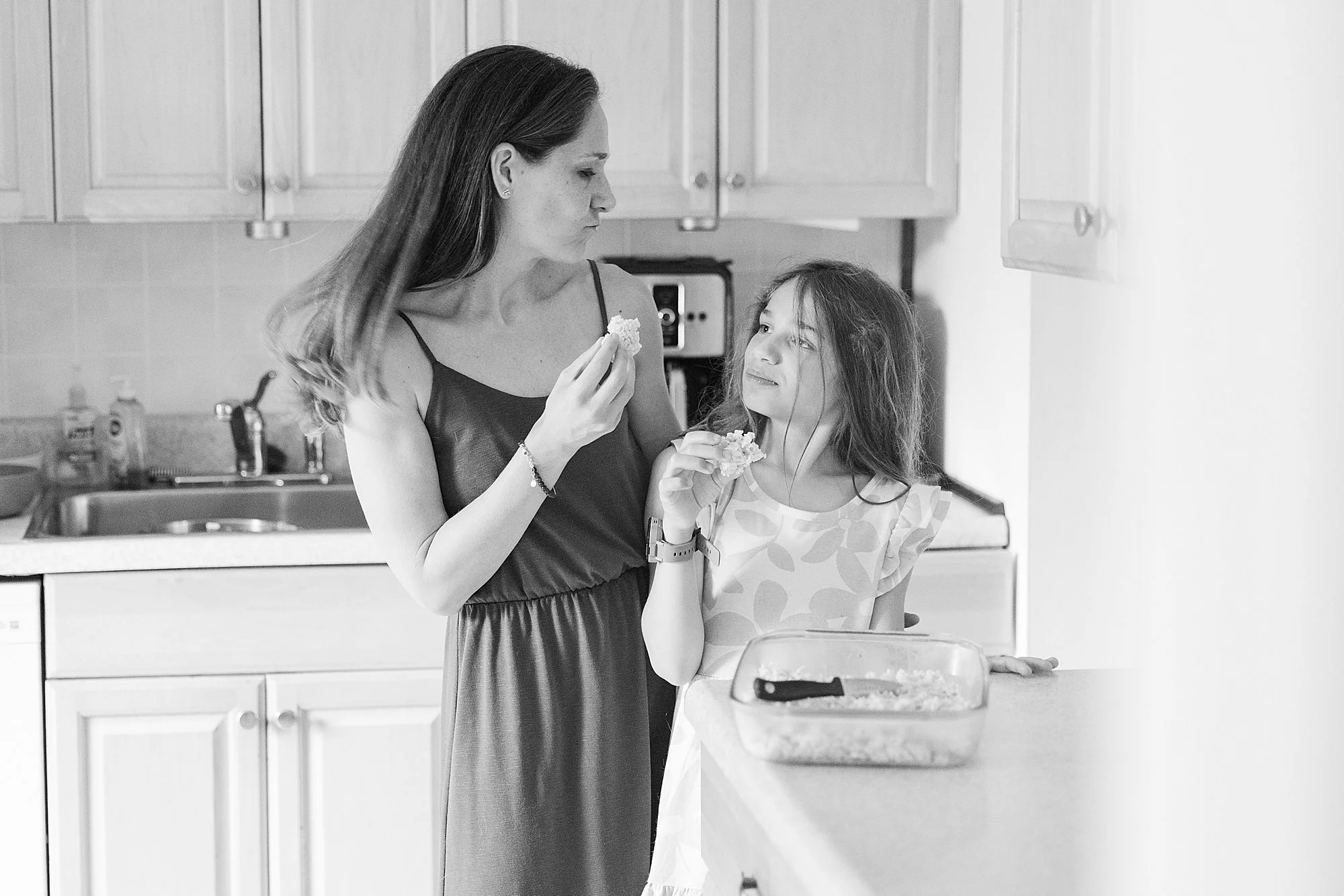  mother daughter baking together 