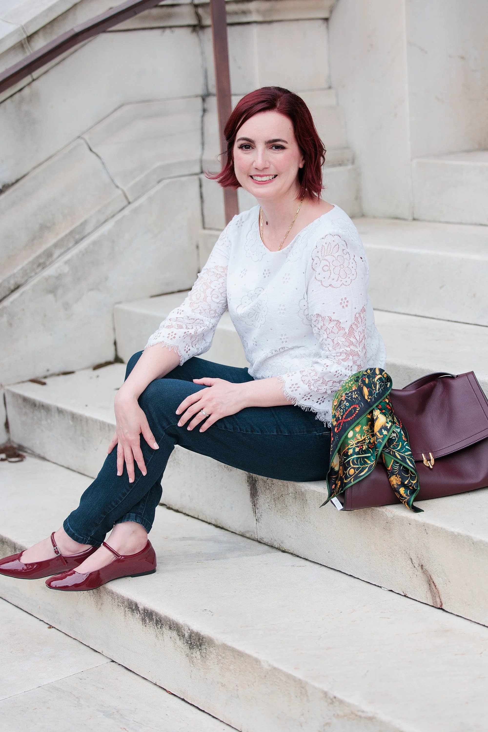 sitting outside Baltimore steps for branding session