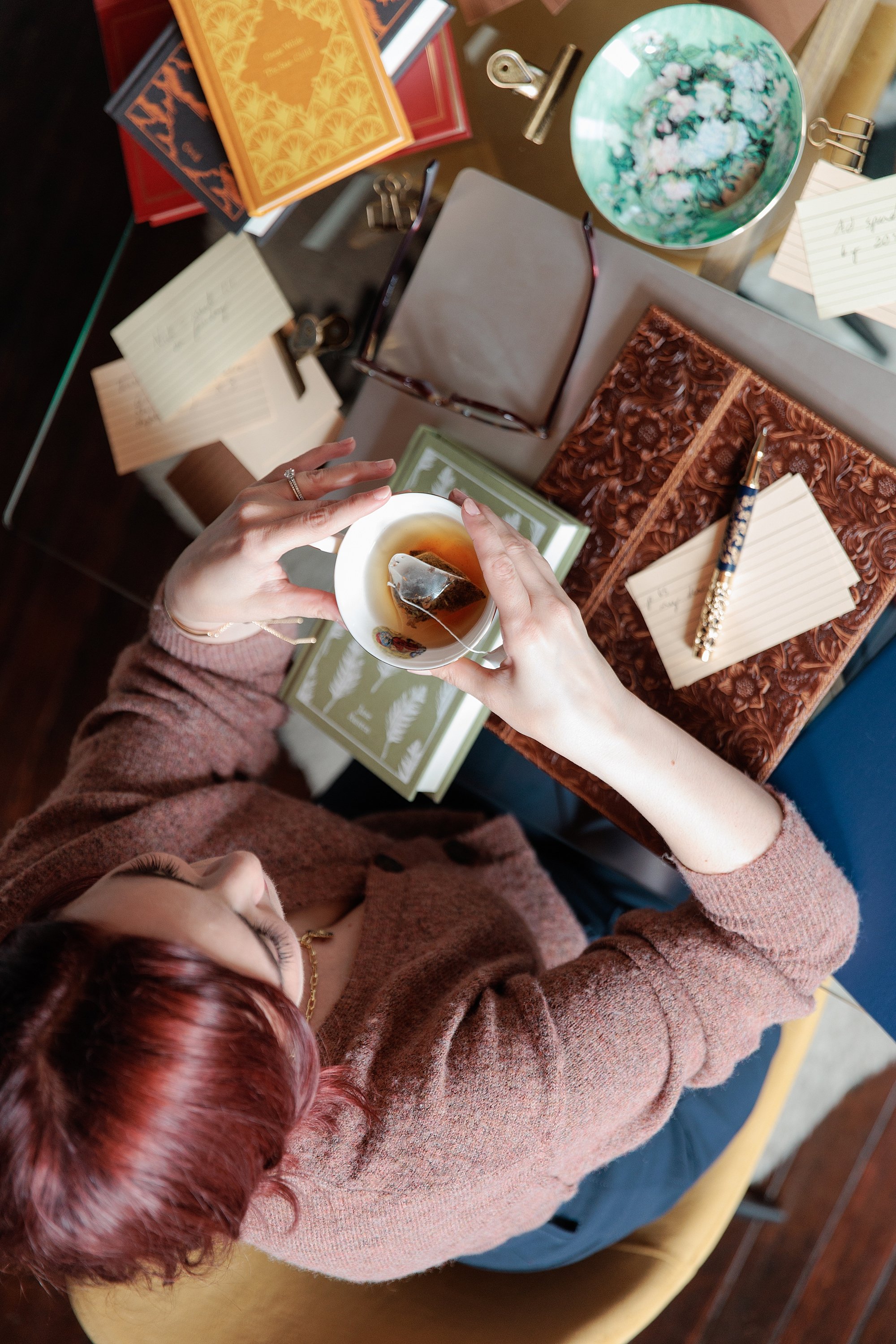 therapist working with tea cup at desk