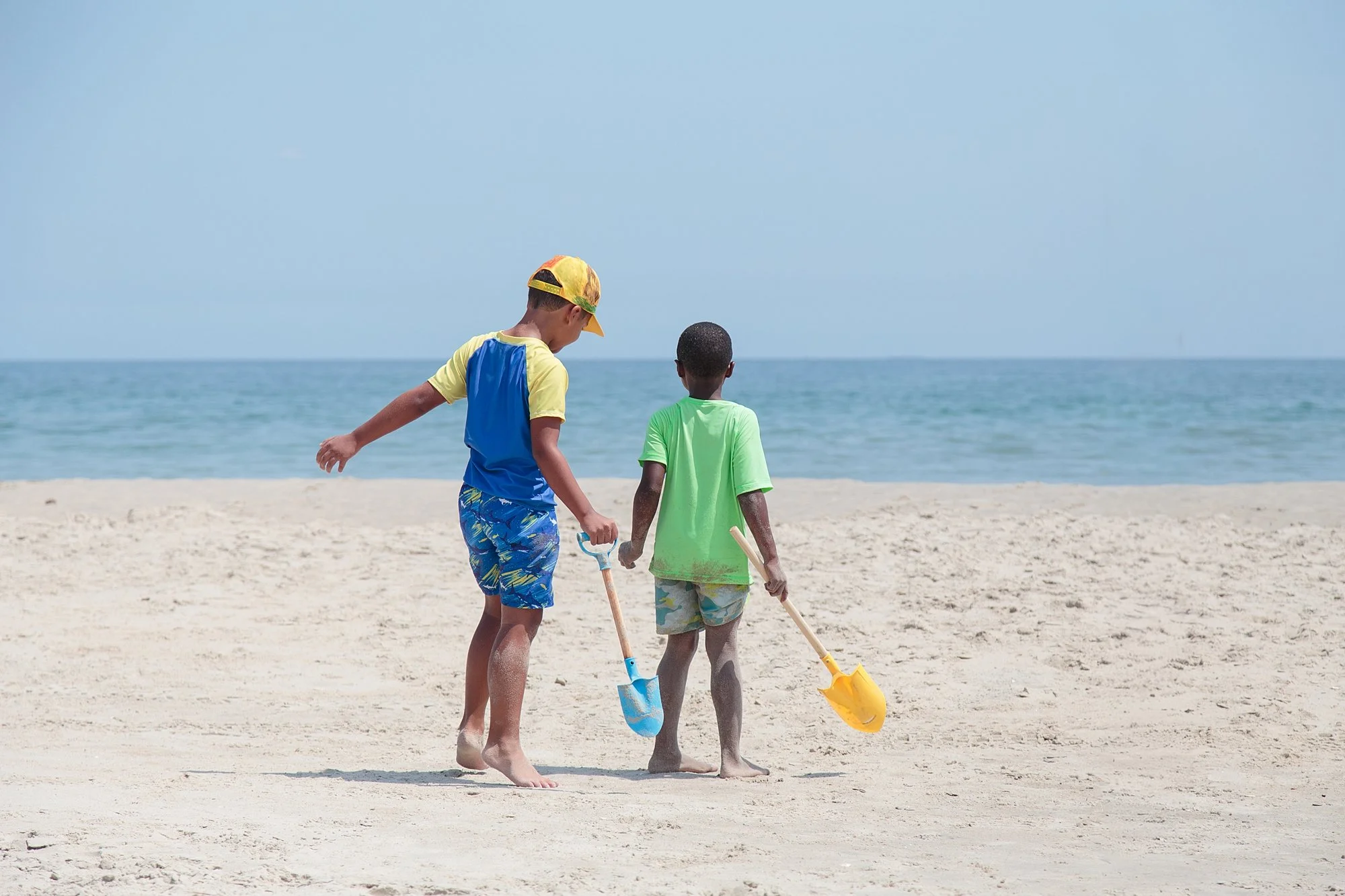 boys in the sand on the beach in the Outer Banks
