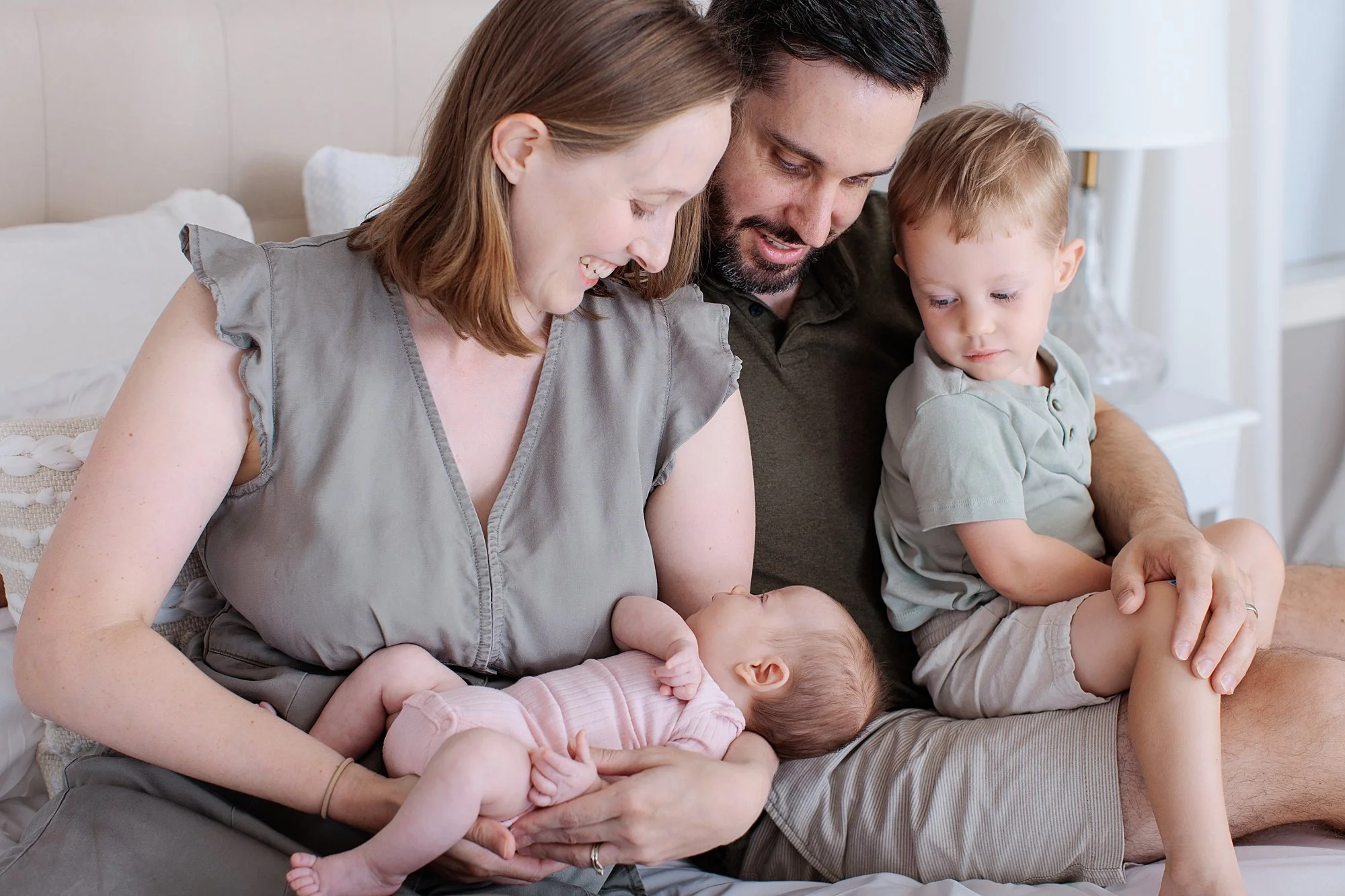 family with baby during studio newborn session