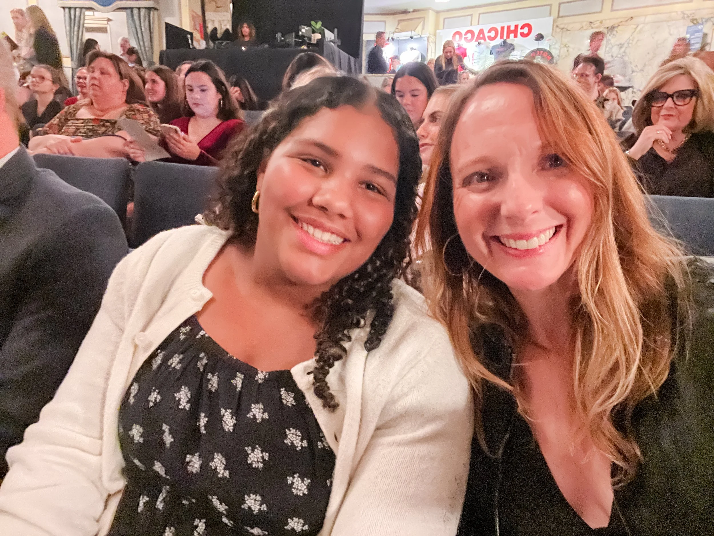 sitting in theater seats in NYC