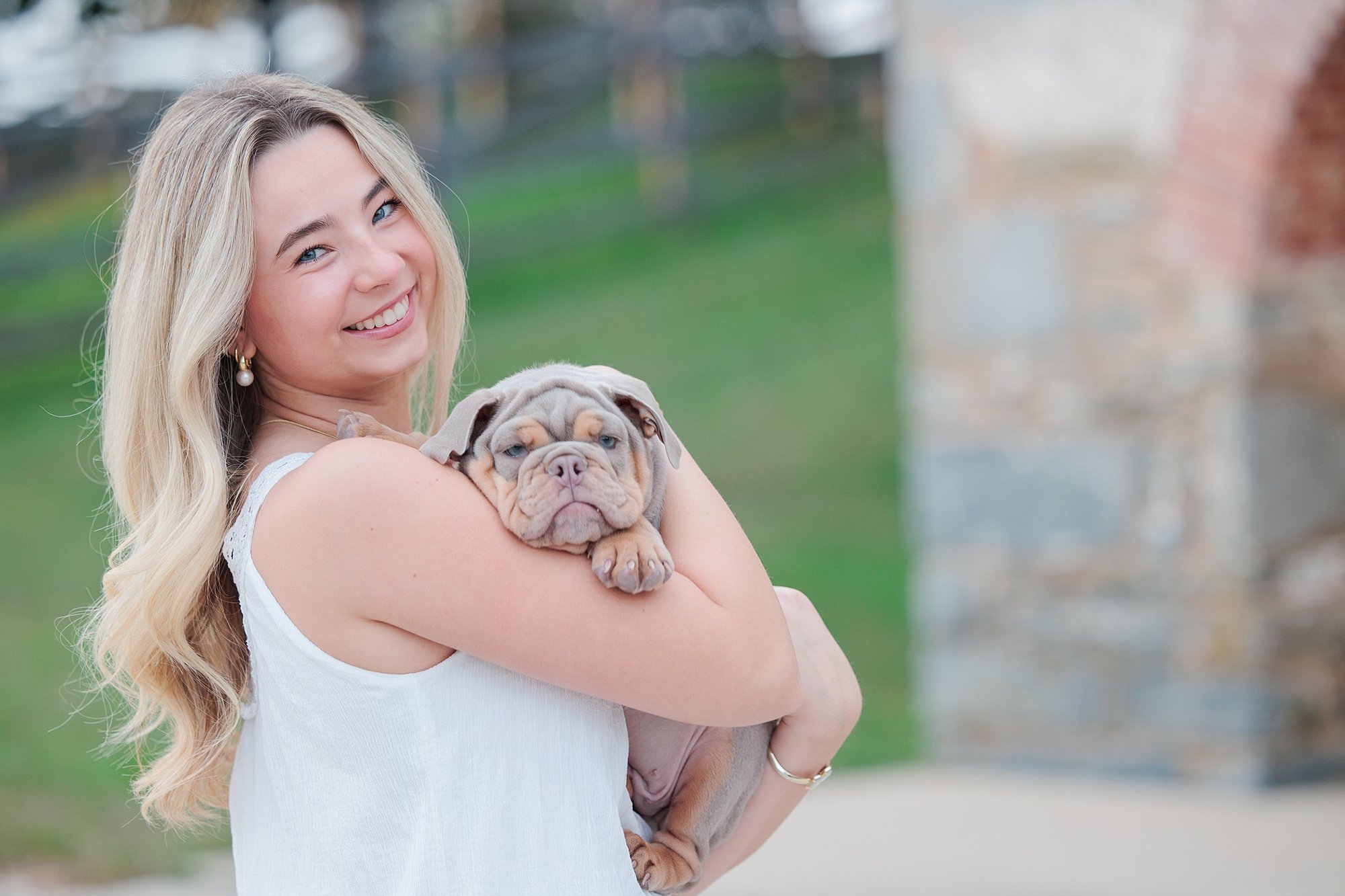 senior photo session with bulldog puppy in Maryland
