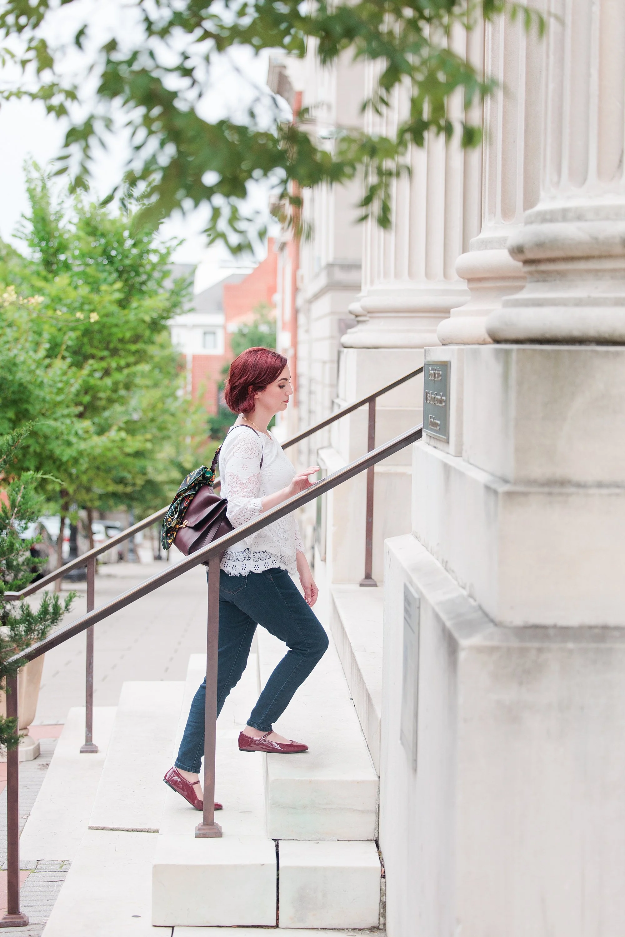 walking up steps at peabody in Baltimore