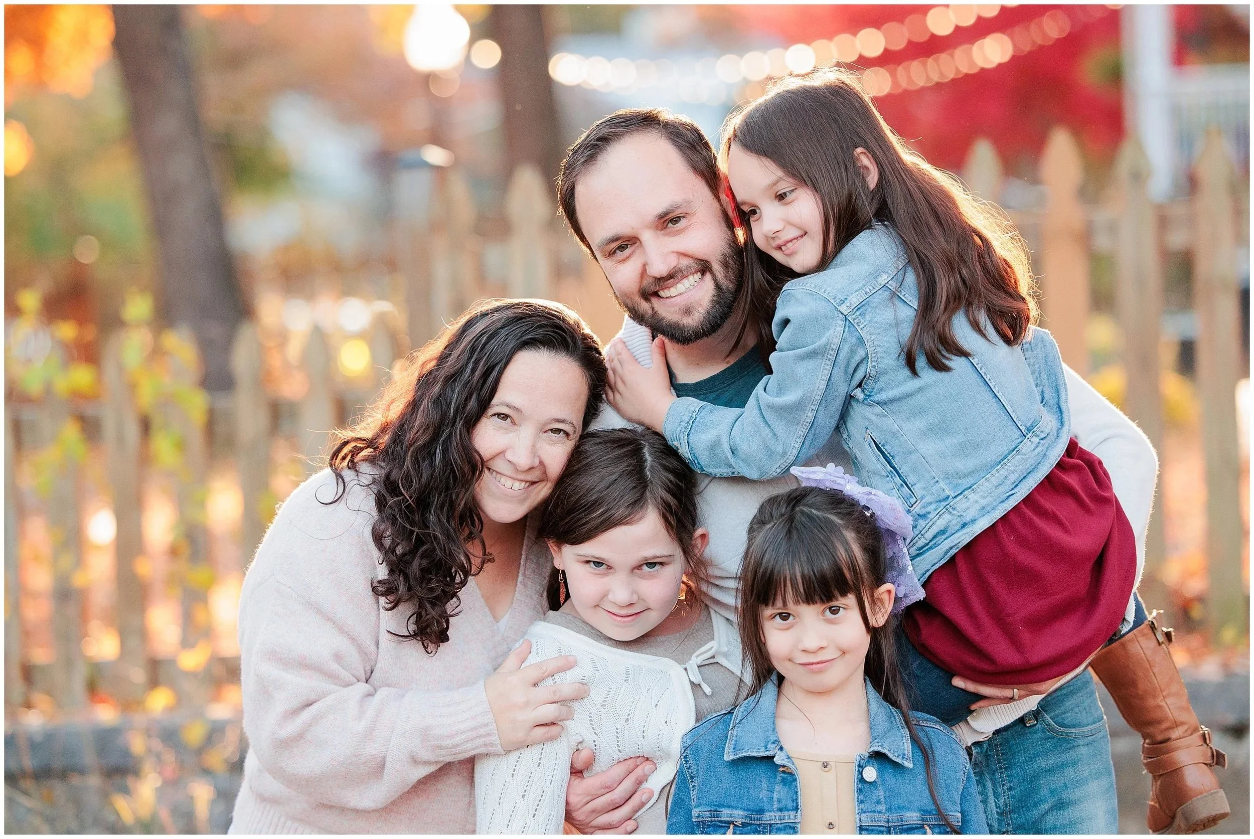 fall family smiling together during fall family session