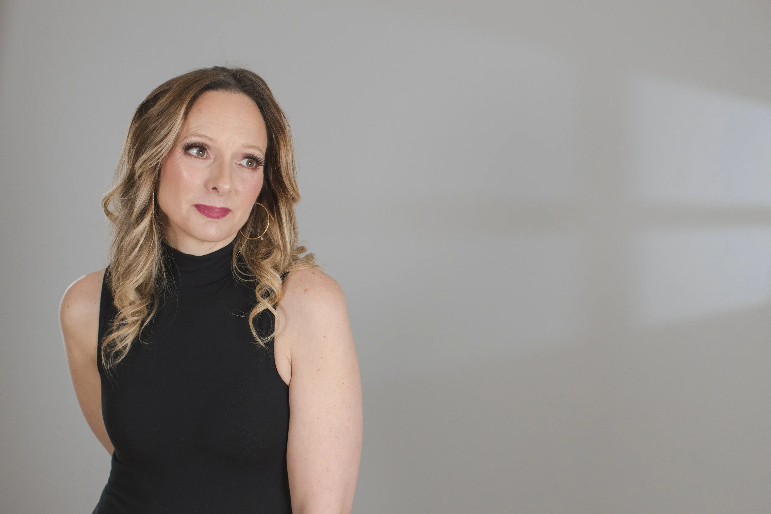 dressed up glam photo of middle aged woman