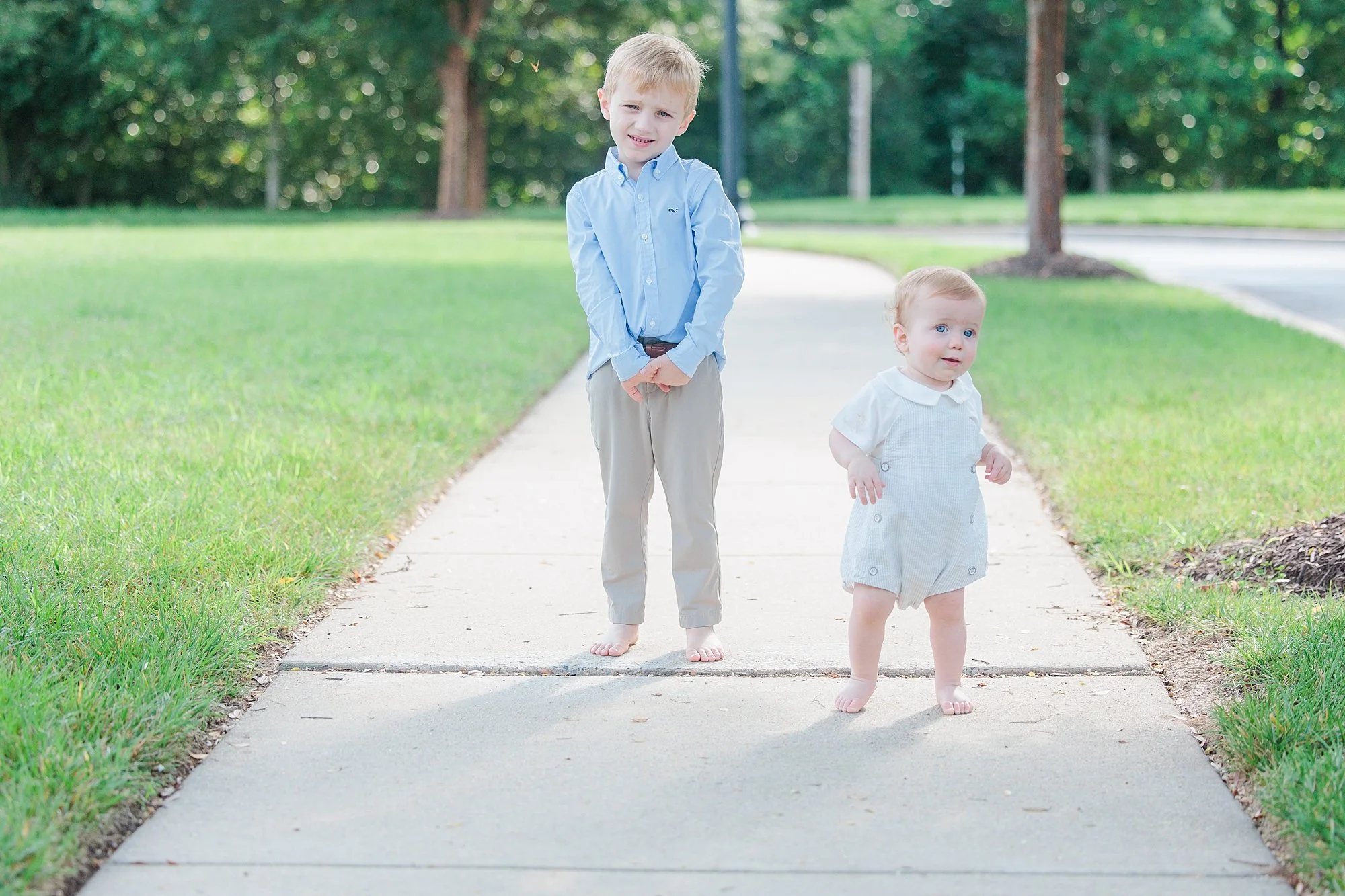 two brothers on a walkway during mini session Silver Spring MD