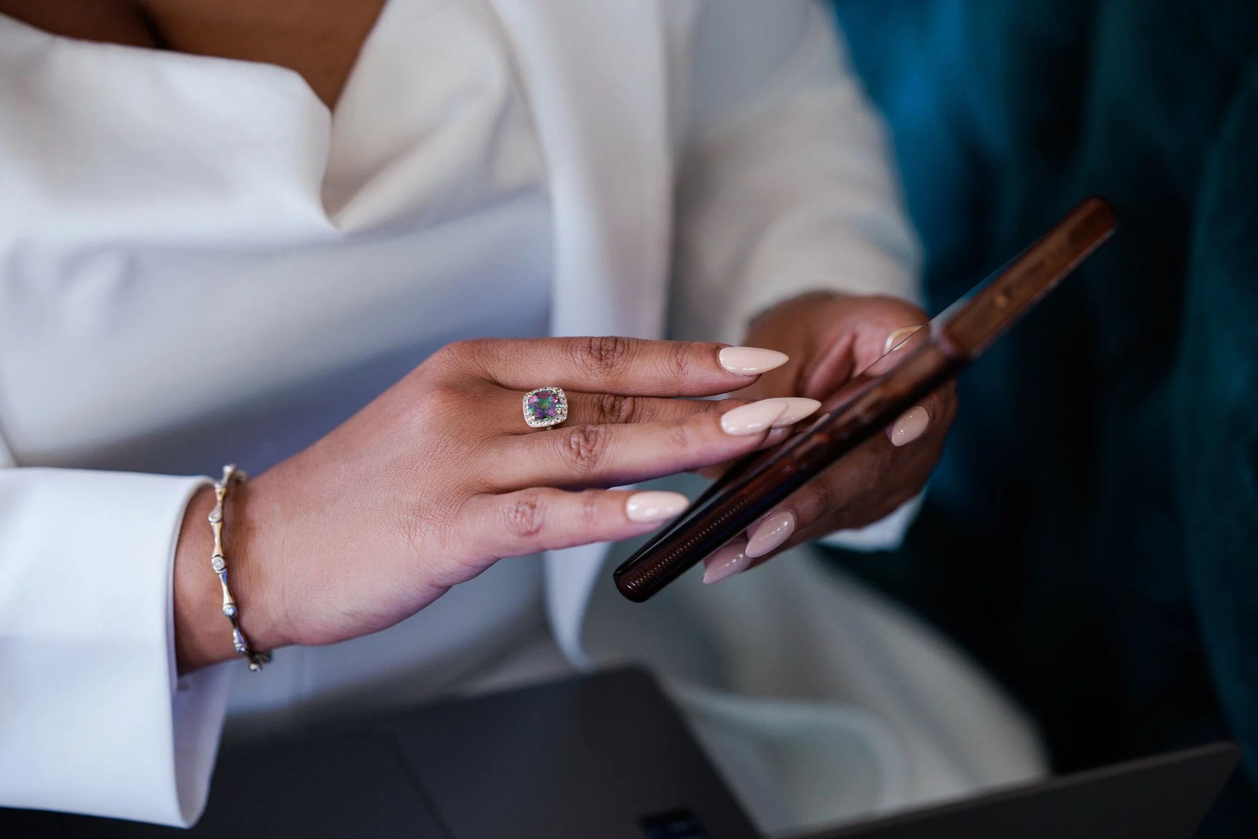 brand photo close up of hand on phone
