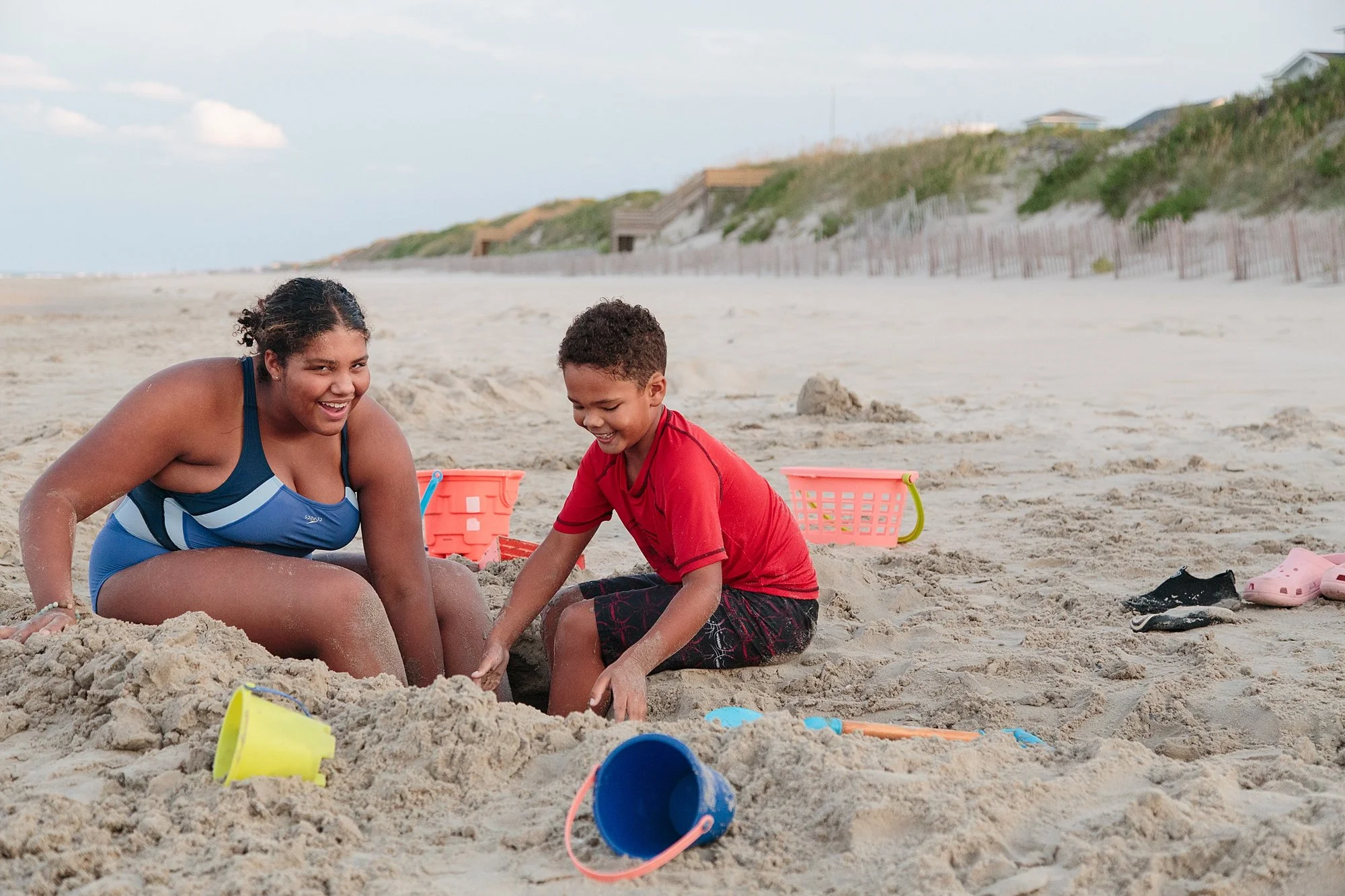 kids playing in sand in Outer Banks NC