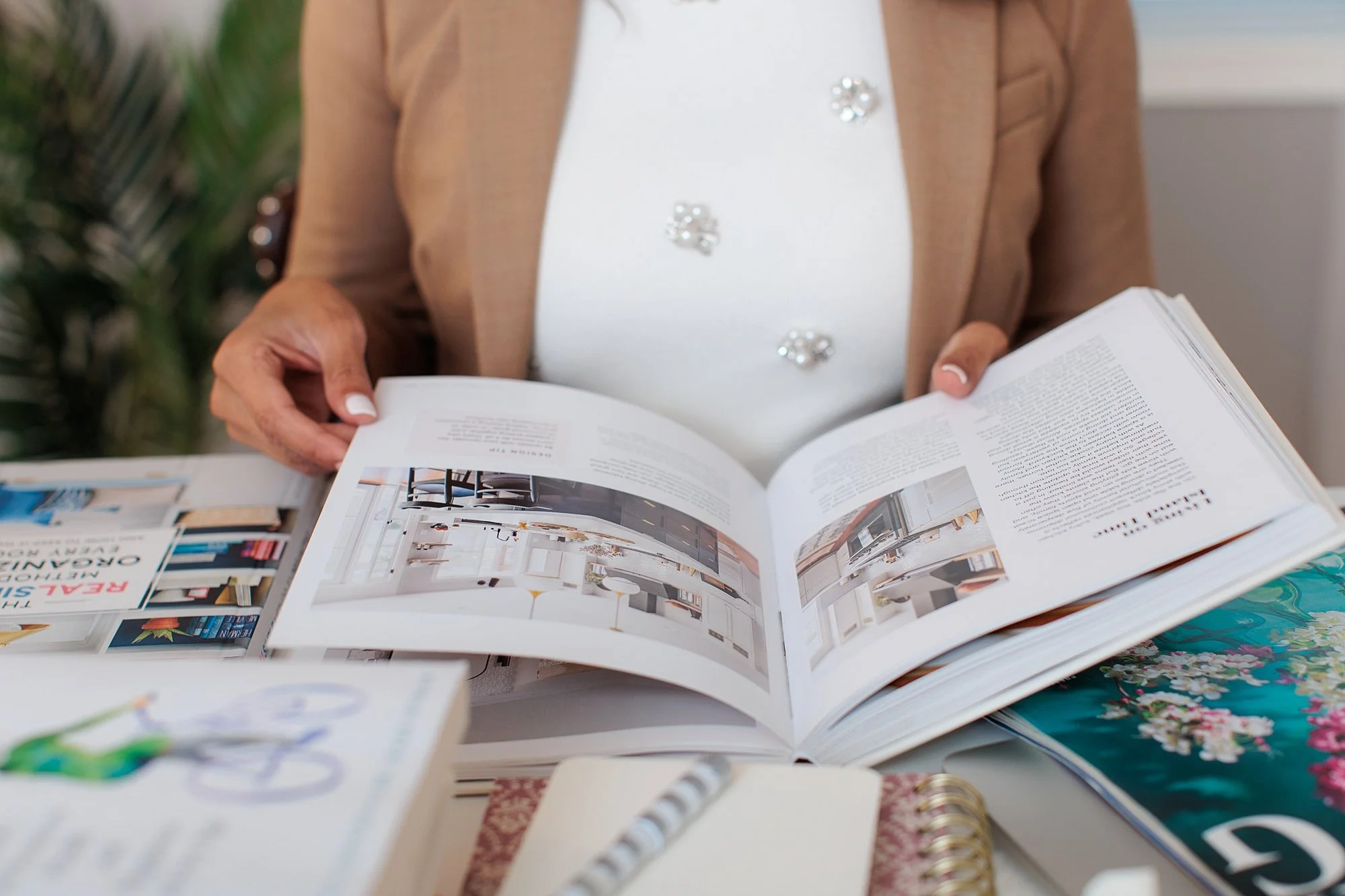 Small business owner arranging products for a branding photoshoot