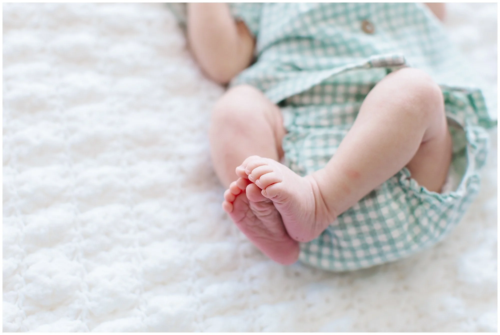 close up of baby feet during a lifestyle newborn session maryand.