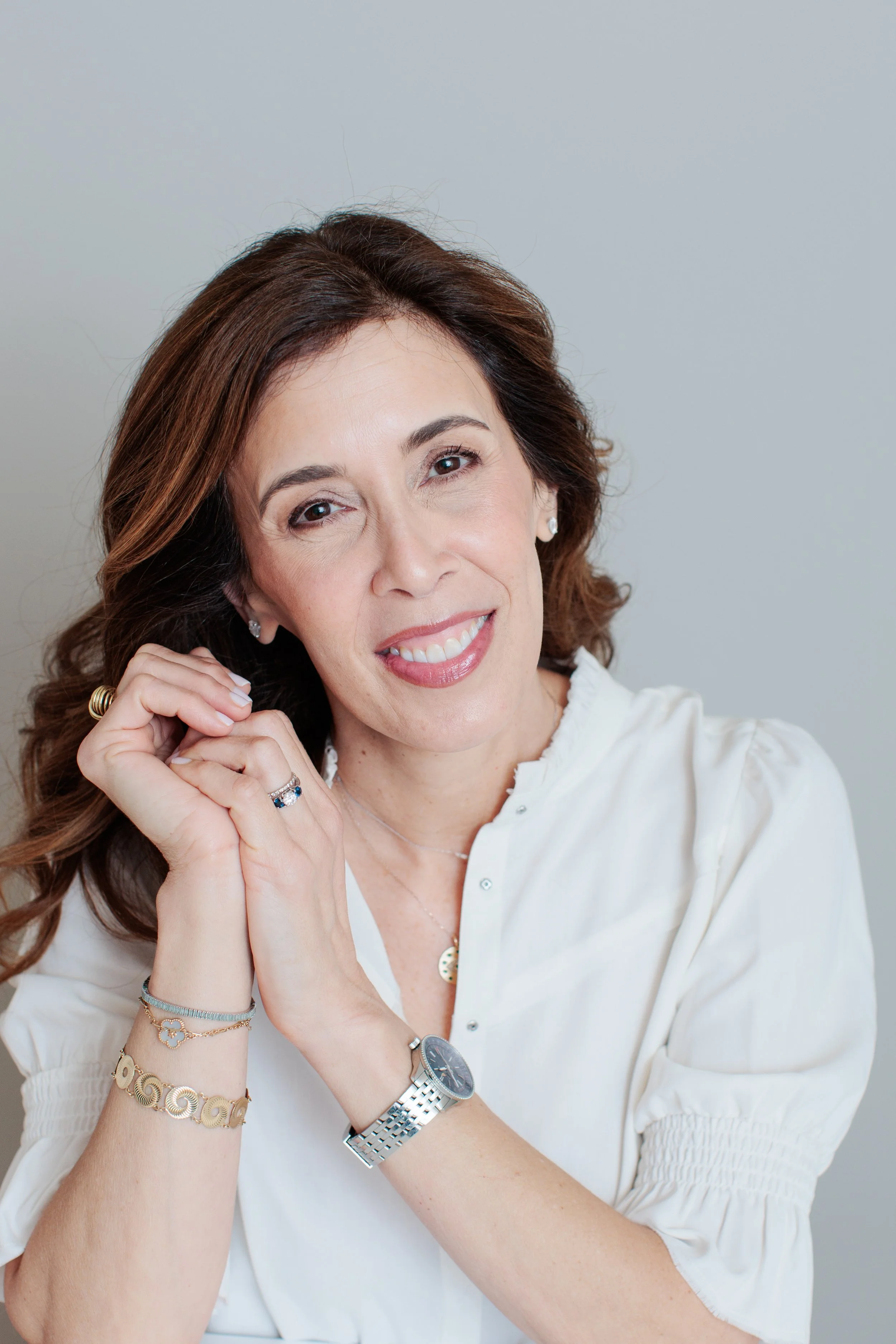 headshot of woman in white shirt in Silver Spring photo studio