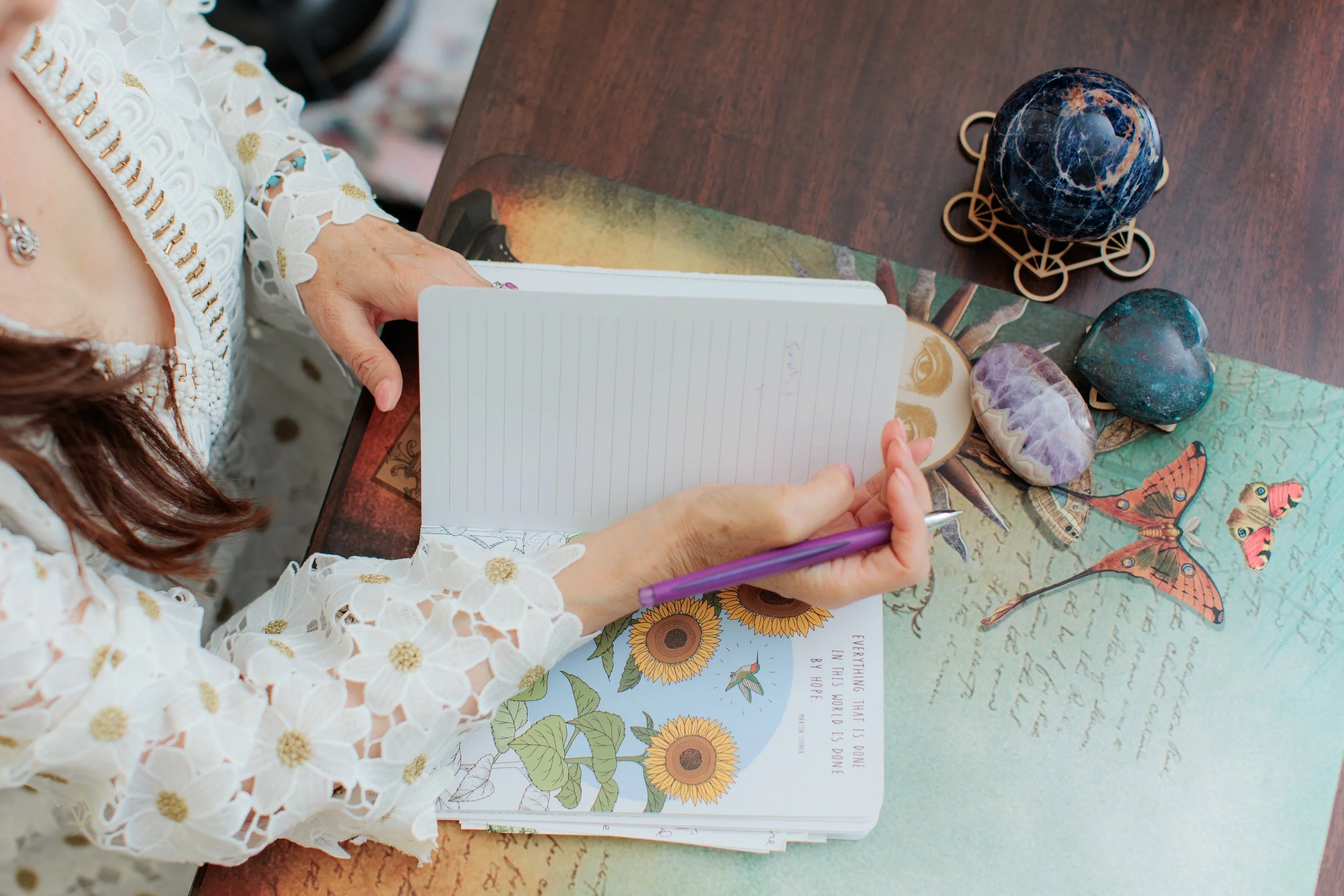 brand photo of woman writing in her journal in Rockville MD