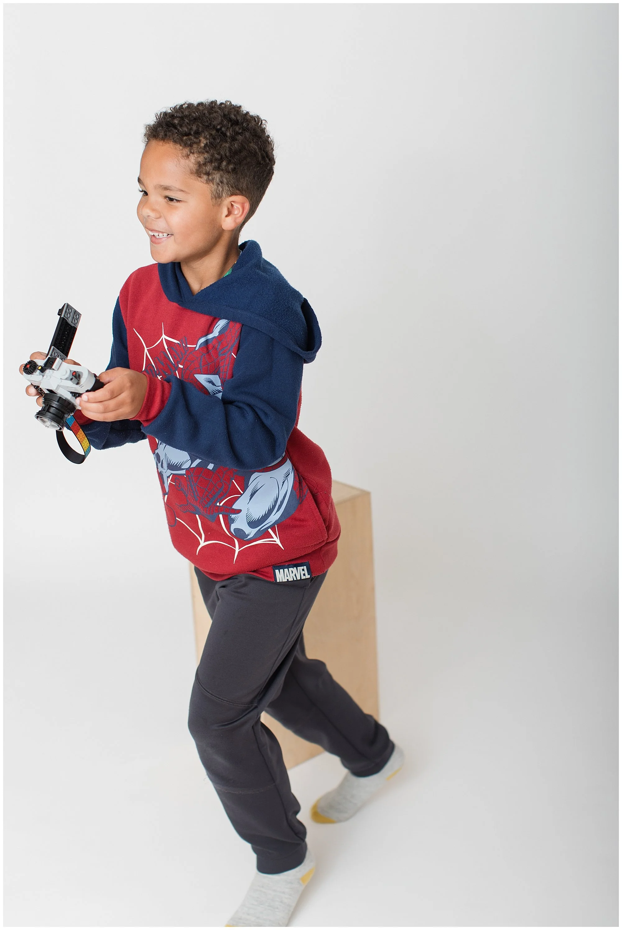 child laughing during studio birthday session in Silver Spring MD