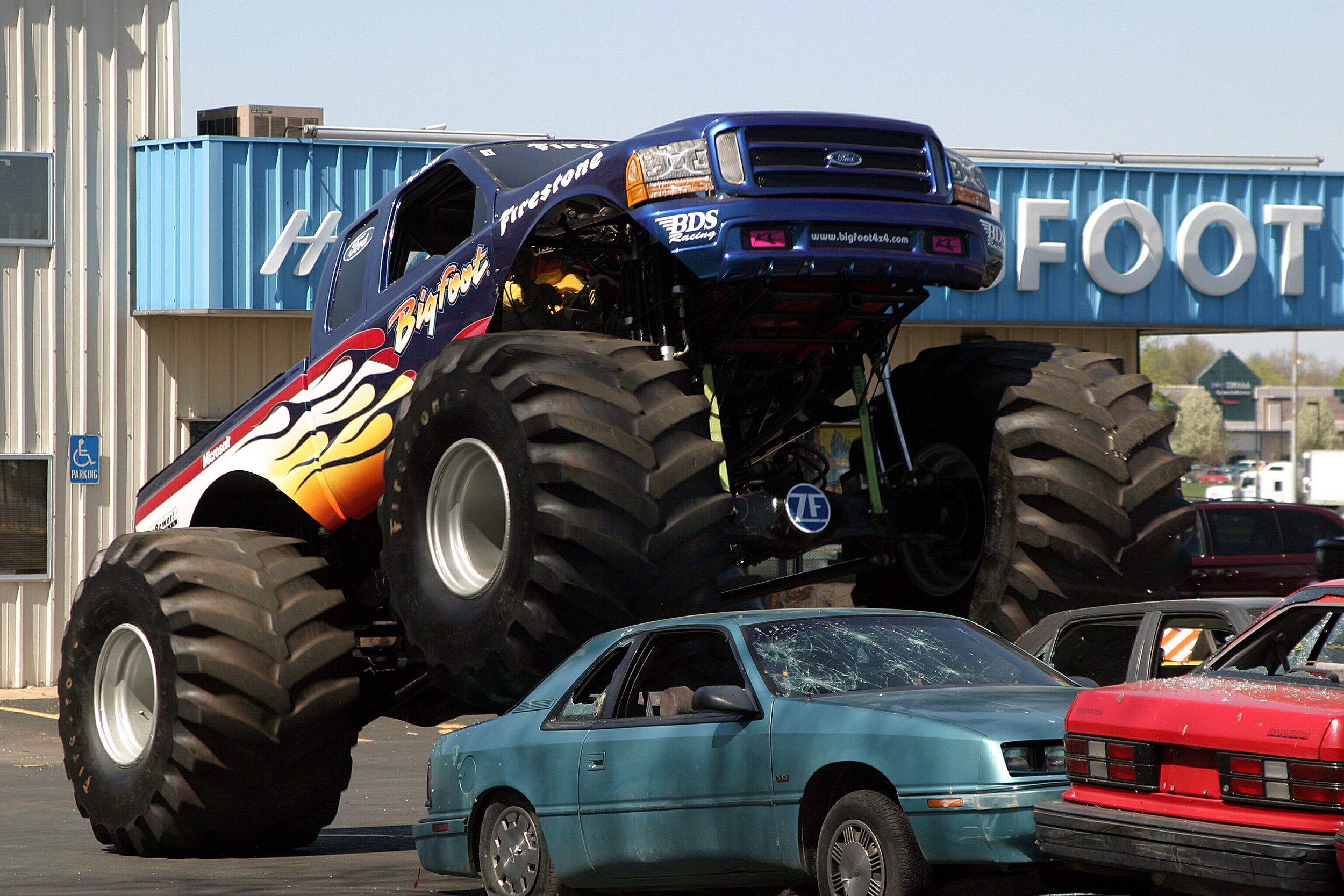  Think of this step as a cat playing with a mouse before trampling it. Long slowly takes the bounce out of the junk cars by applying a few tons of weight before taking his first run across the top of them. 