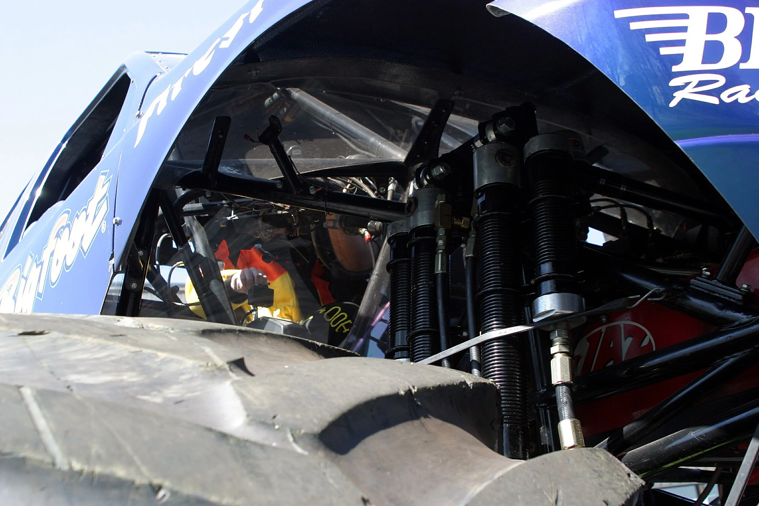  One of my hands and the borrowed fire suit are visible through the plastic firewall in this shot as I receive instruction. 