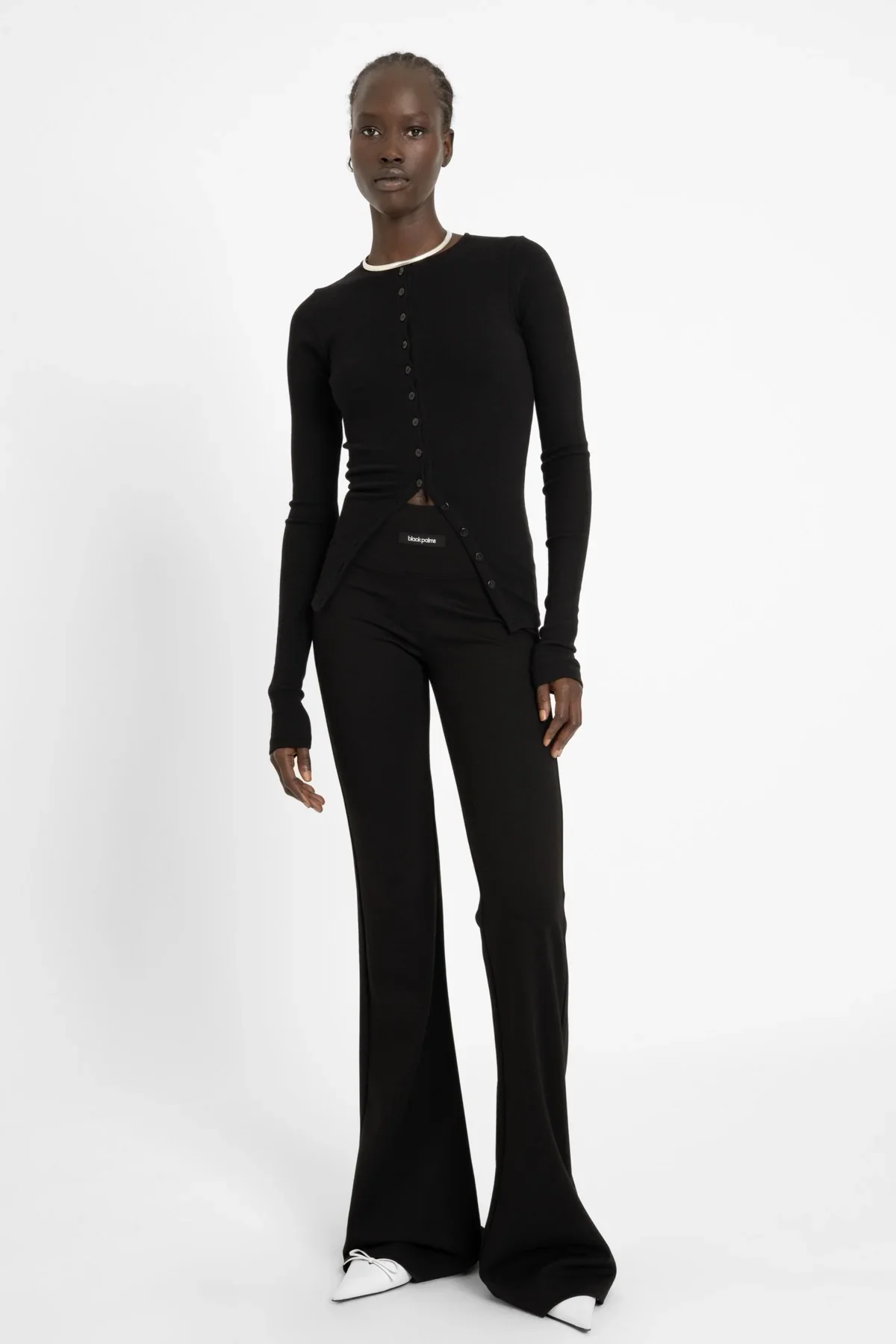 AW26_ECom_FYNA_Flares_Black_1.webp