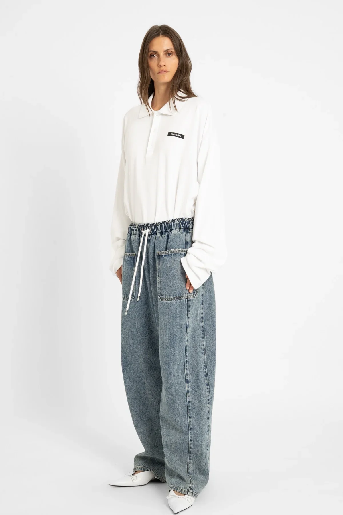 AW26_ECom_ICONIC_026_Polo_White_3.webp