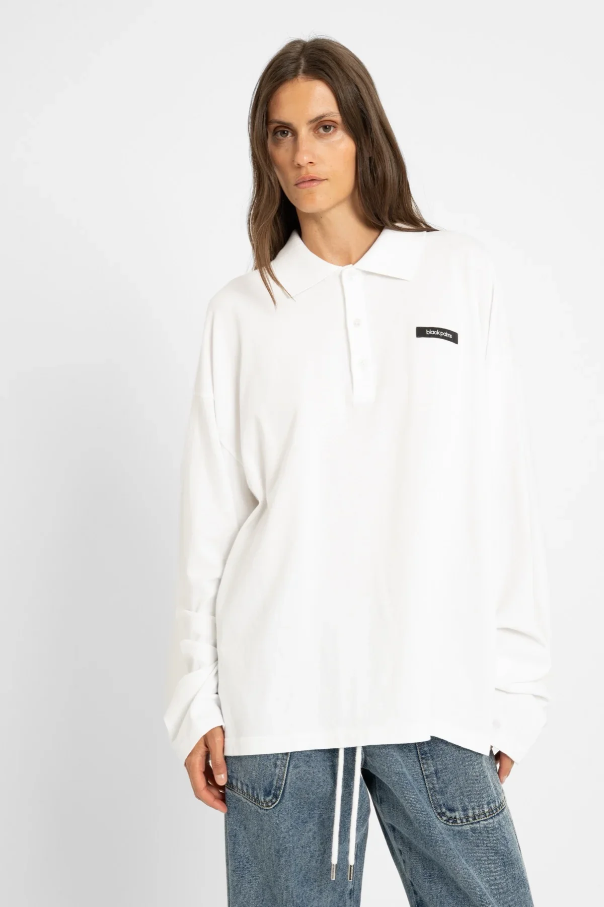 AW26_ECom_ICONIC_026_Polo_White_2.webp