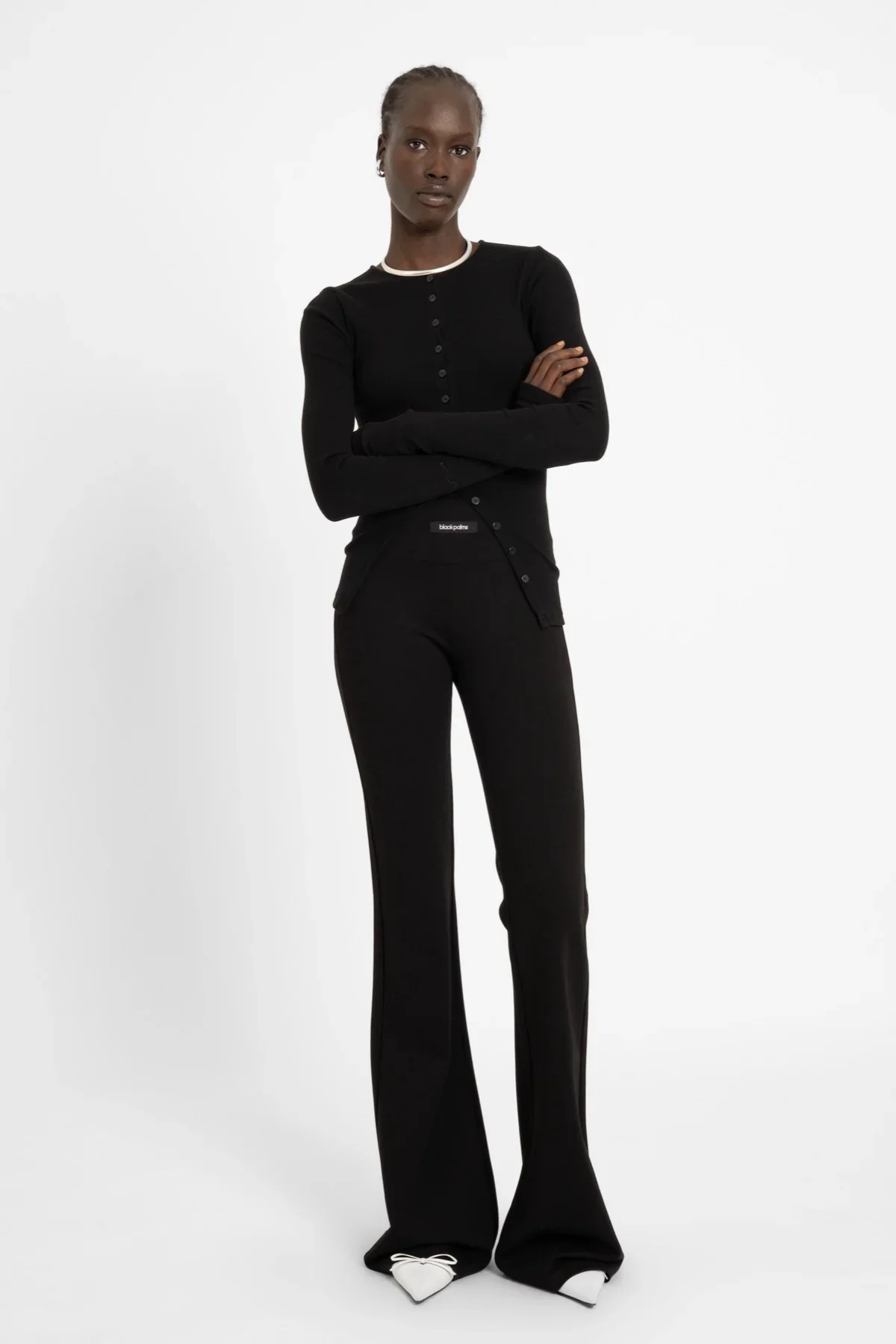 AW26_ECom_FYNA_Flares_Black_3.webp