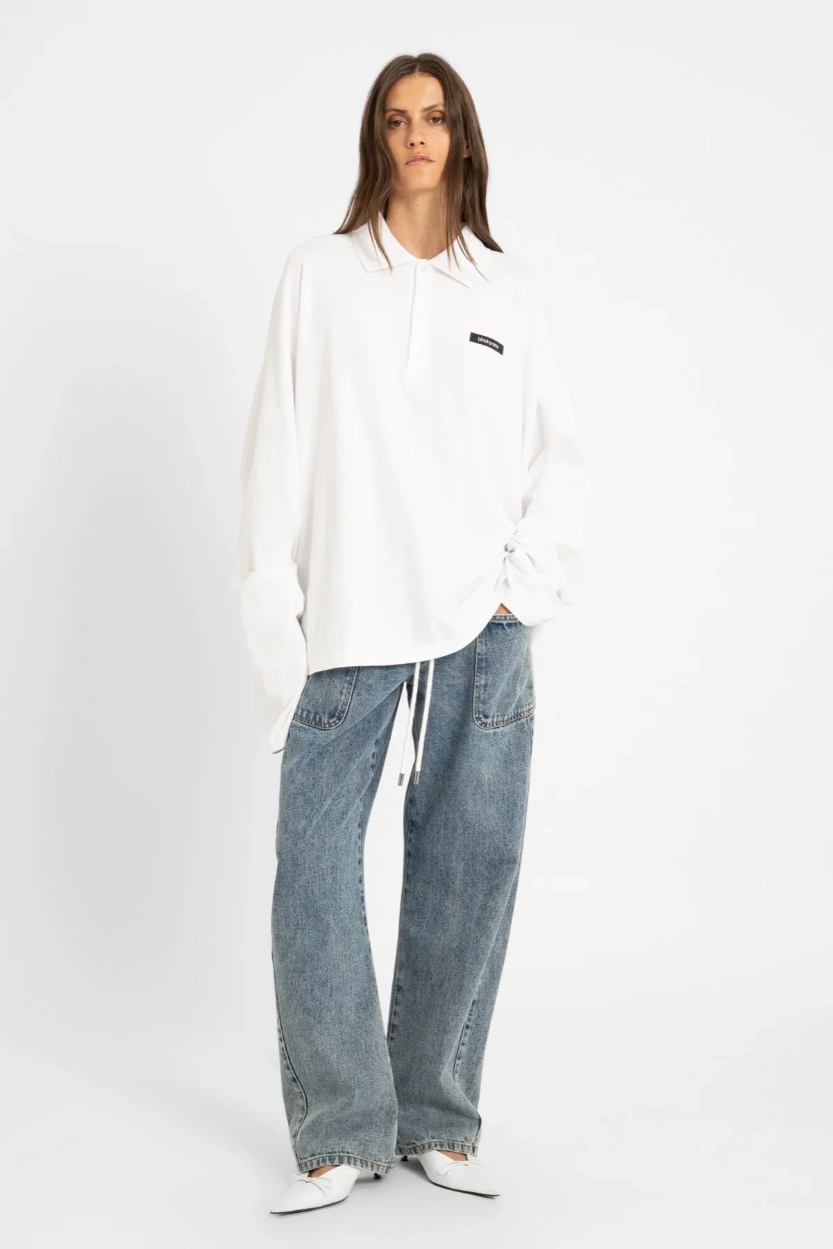 AW26_ECom_ICONIC_026_Polo_White_1.webp