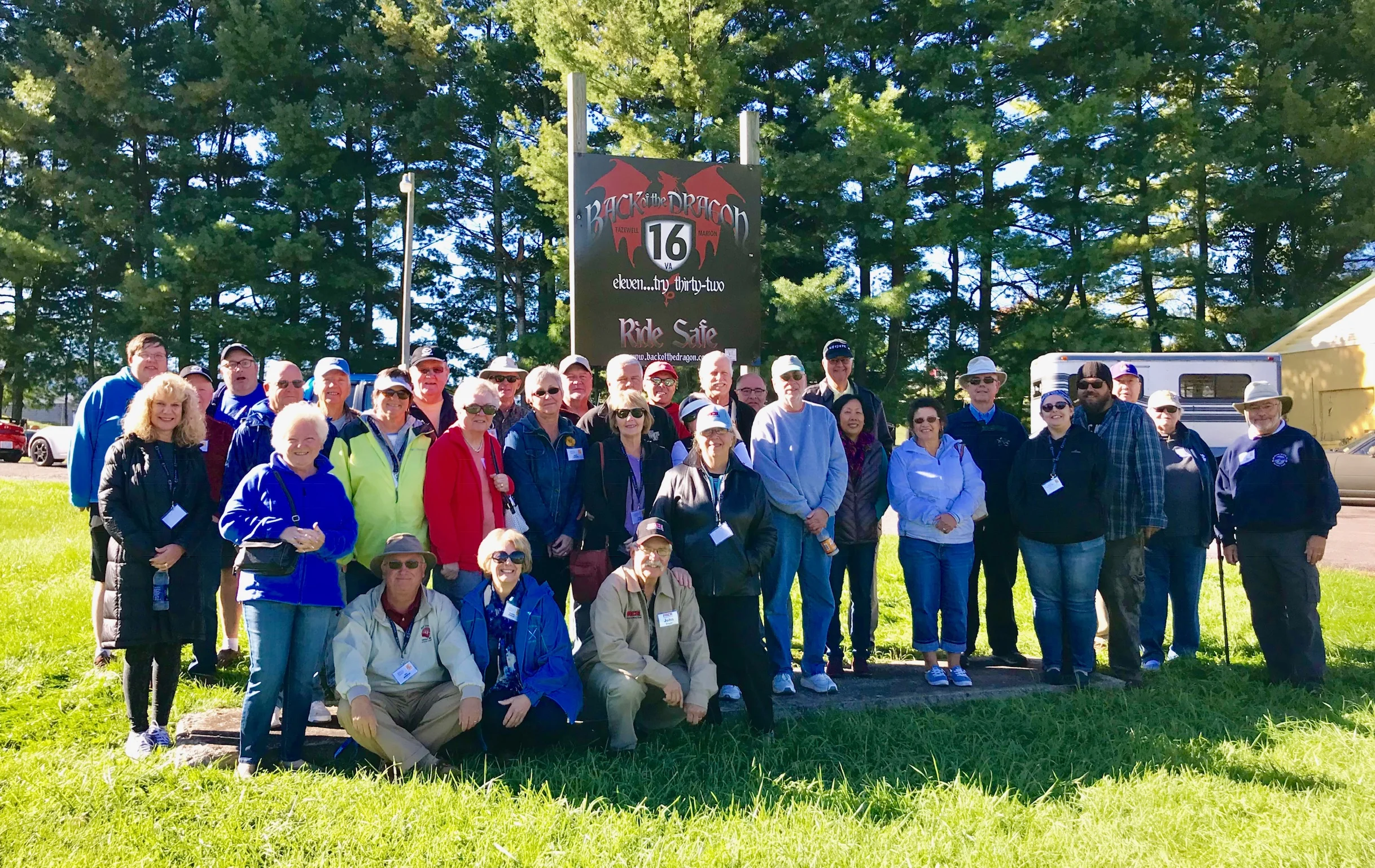 Our group by the Back of the Dragon sign at Thompson Valley Market.