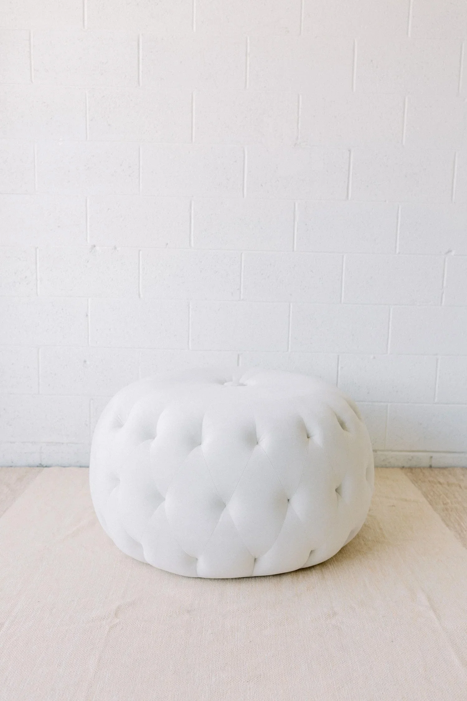 Snowball_Tufted_Pouf_Ottoman_1_wedding_birthday_party_event_upholstered_seating_rentals_Los_Angeles_Orange_County.jpg