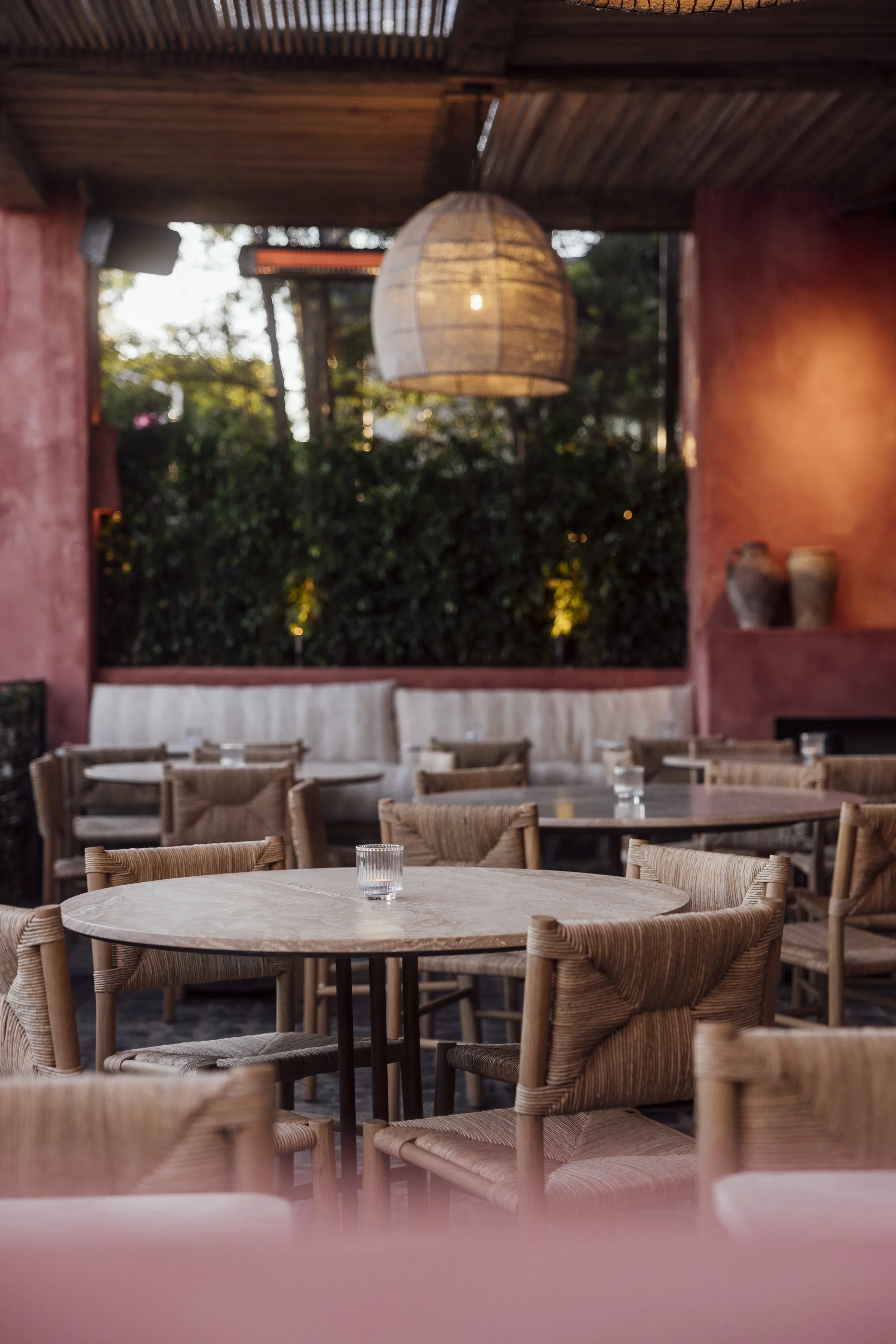 An evening oasis. The heated outdoor terrace at Great White Restaurant West Hollywood features terracotta plaster walls and a romantic atmosphere on Melrose Avenue.
