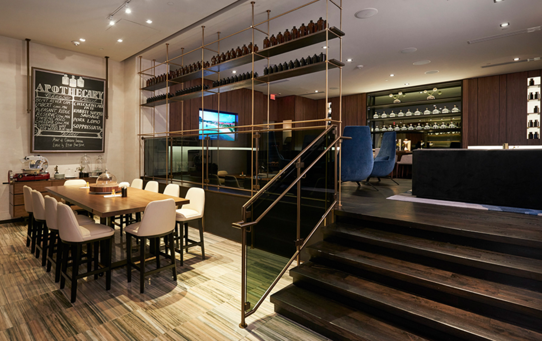 Amuneal’s Collector’s shelving system doubles as a guardrail along the stairs and platform in the Loews hotel in Minneapolis. Photo courtesy of Amuneal