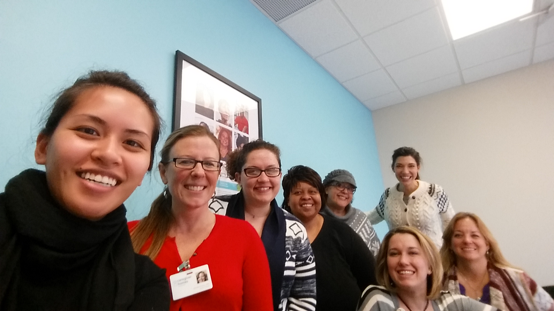  The product manager and I pose with the team of care managers in this Caregiver Homes branch in Indiana. 