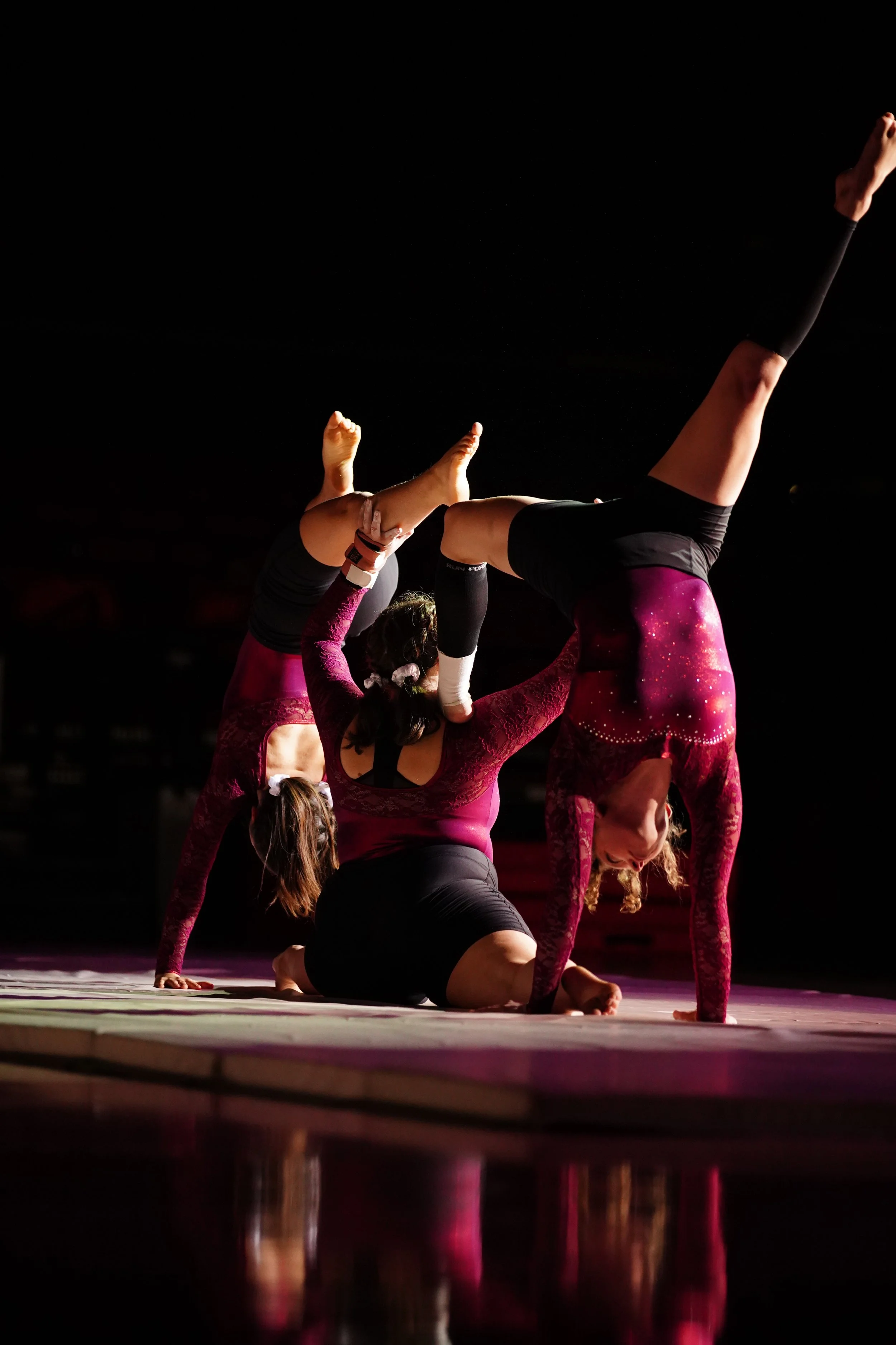  Aggie Baum, Alison Layton, Ali Clingan balancing 