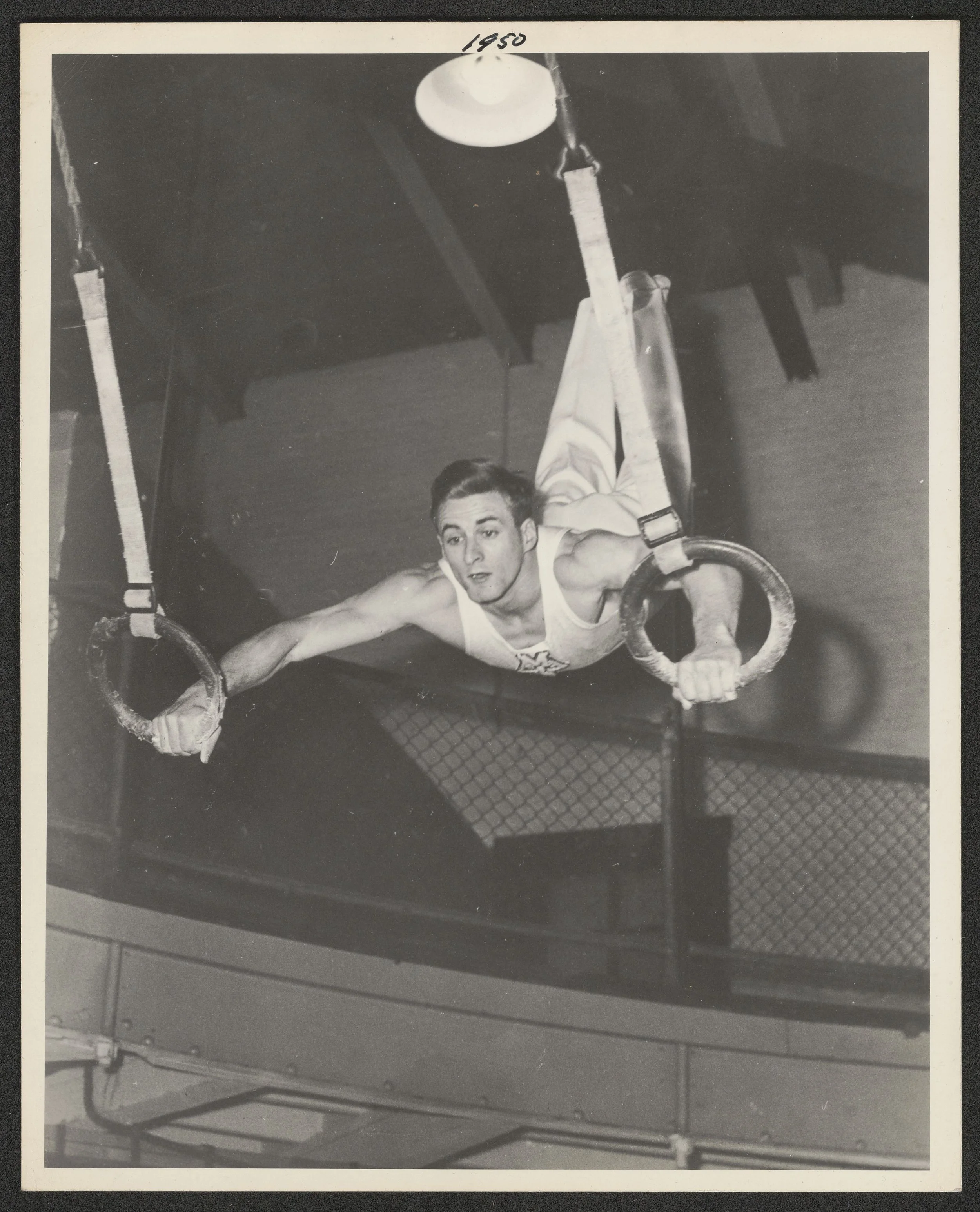  Al Kuckhoff performs a cast on the rings, 1950 