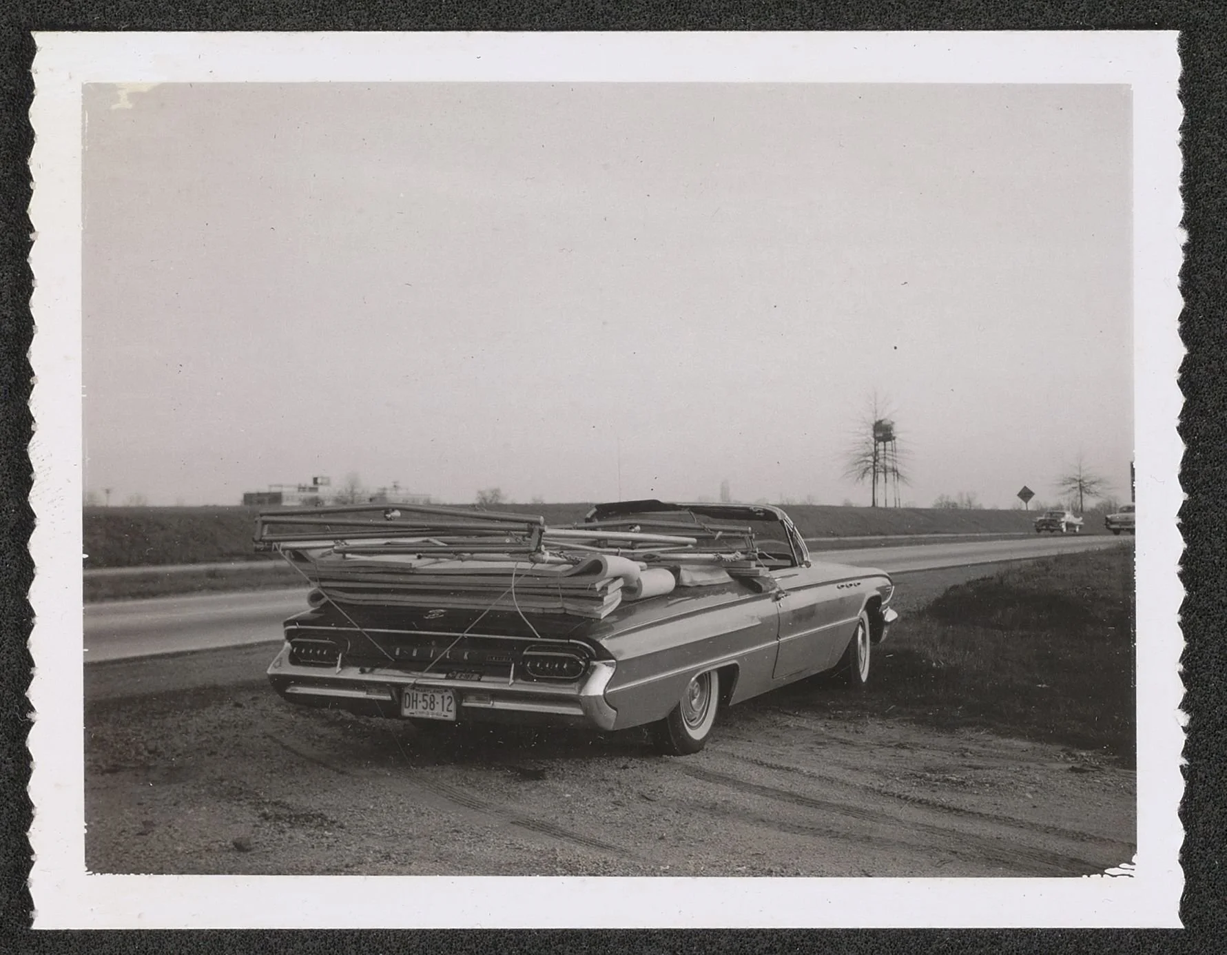  A car with a Gymkana trampoline attached to it 