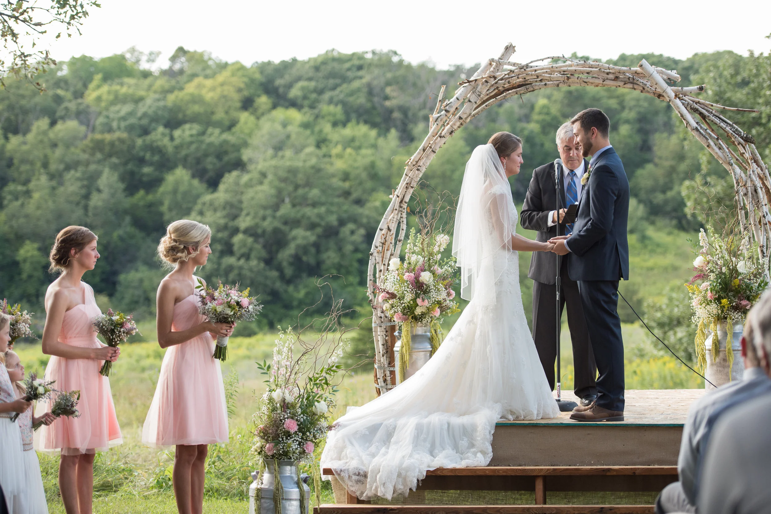The rolling hills of Almquist Farm make a stunning backdrop for your ceremony. Enhance the natural beauty of the landscape with your own floral arrangements and decor, or feel free to say your vows under your choice of our handmade arbor, trellis, cross, or just the stage.