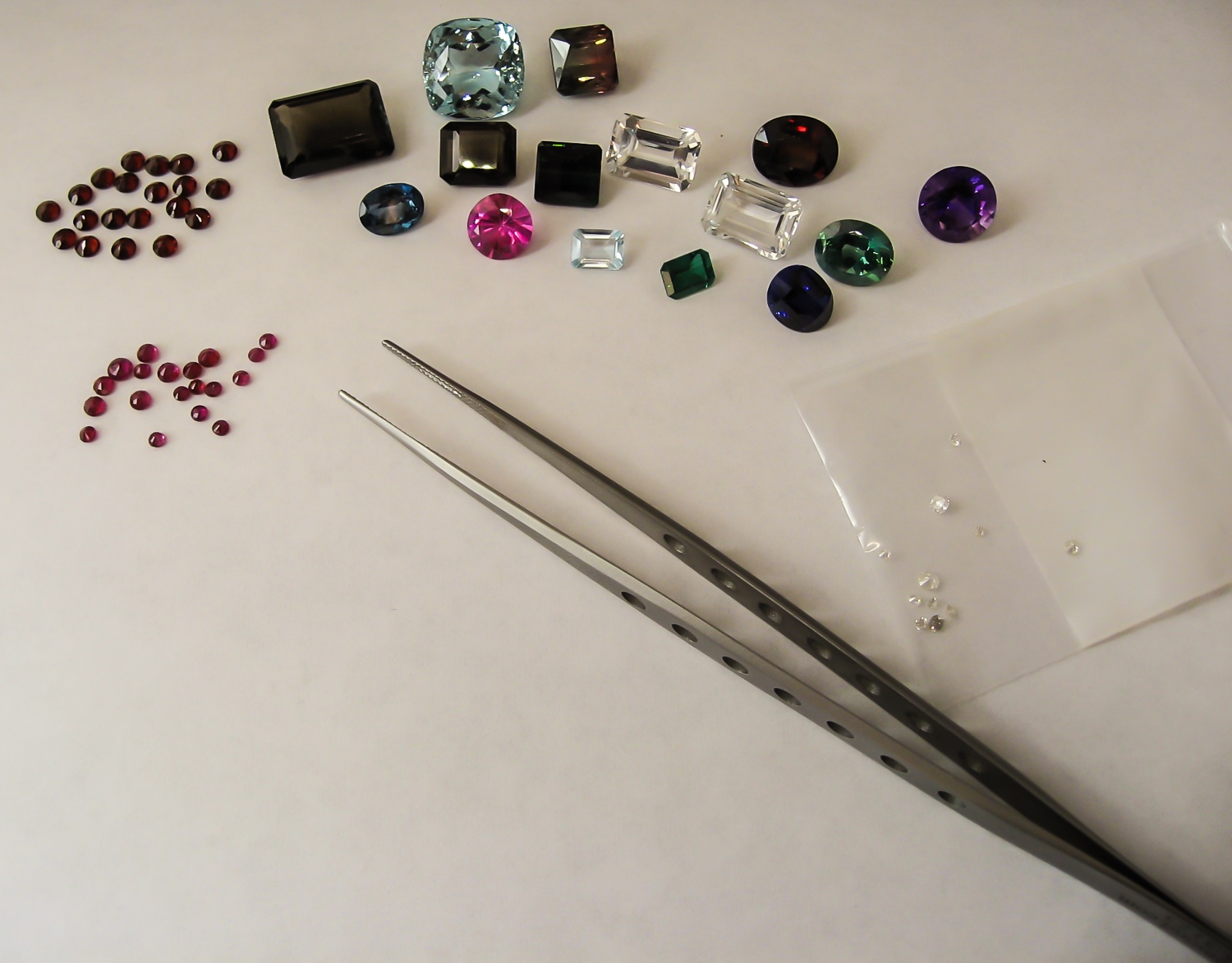   We remove all the gemstones and begin measuring them.  