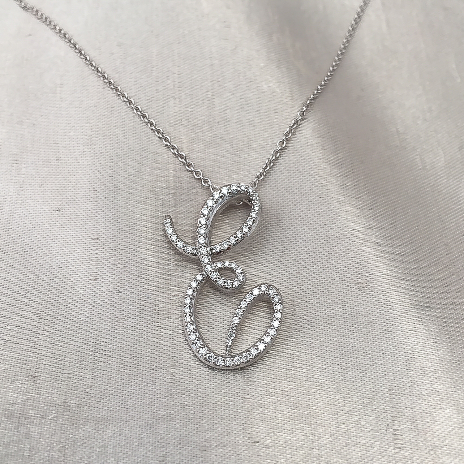   Custom Diamond Initial E Pendant.  