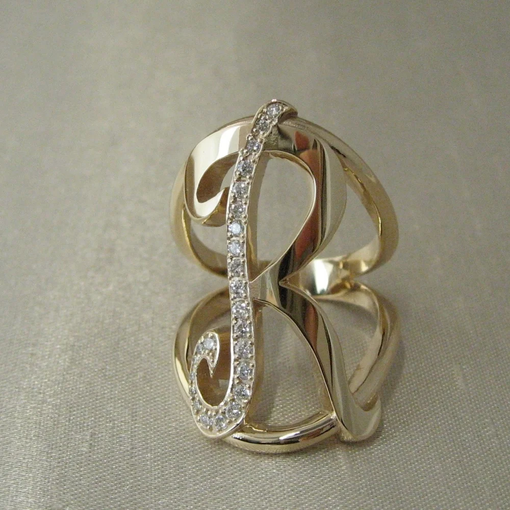 Yellow Gold Initial R Ring with Diamonds.