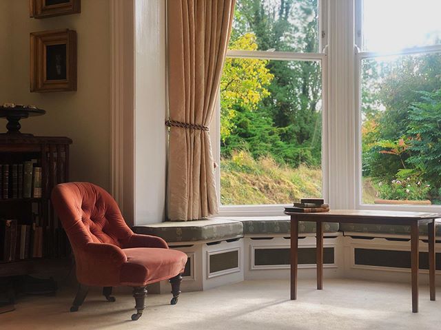 The bay window in the sitting room is the perfect place to sit and read at the end of the day, or just watch the birds 🦉