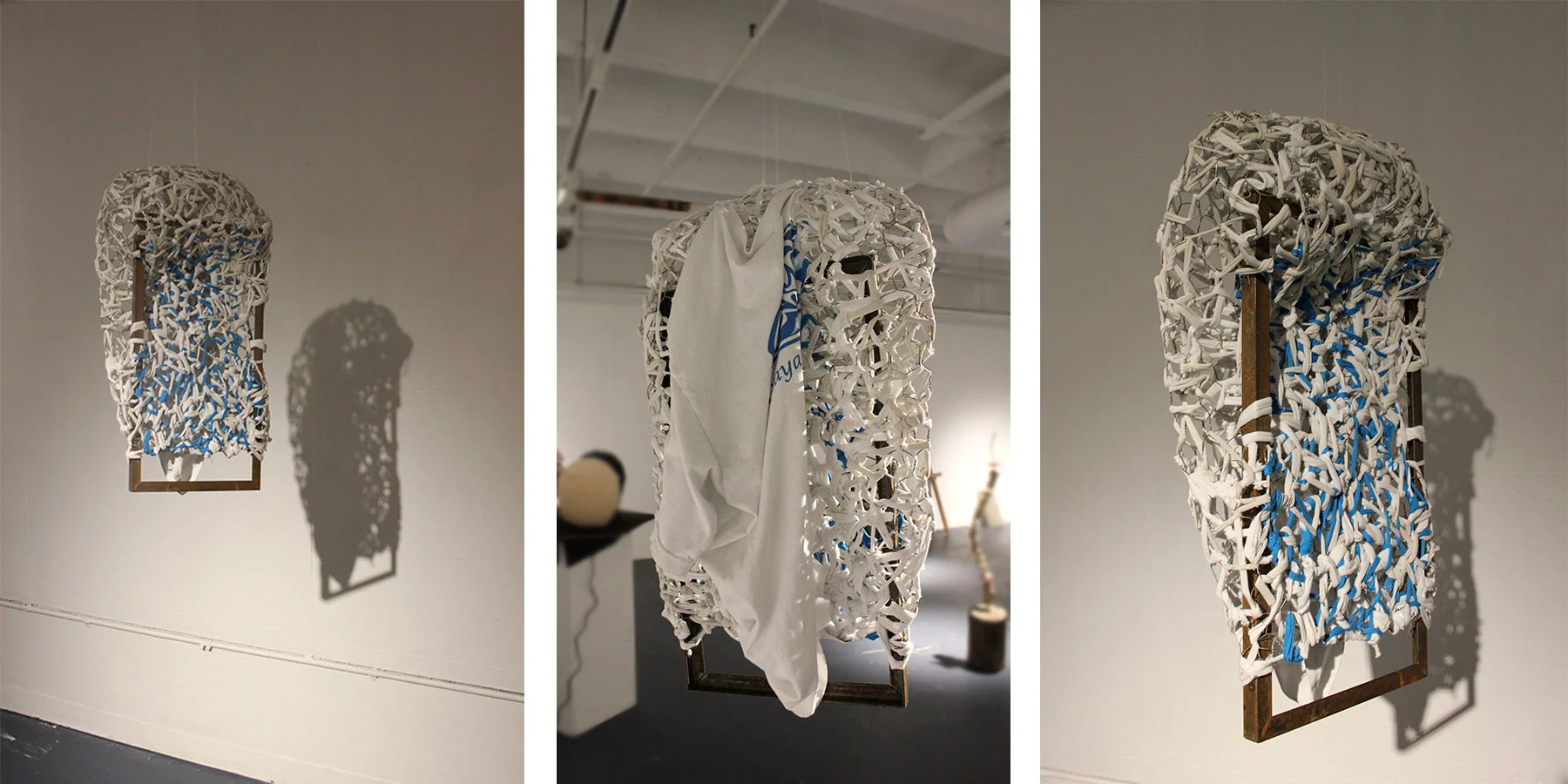 Confined, 20” x 36” x 13”, Formed chicken wire, and t-shirt fabric on metal frame