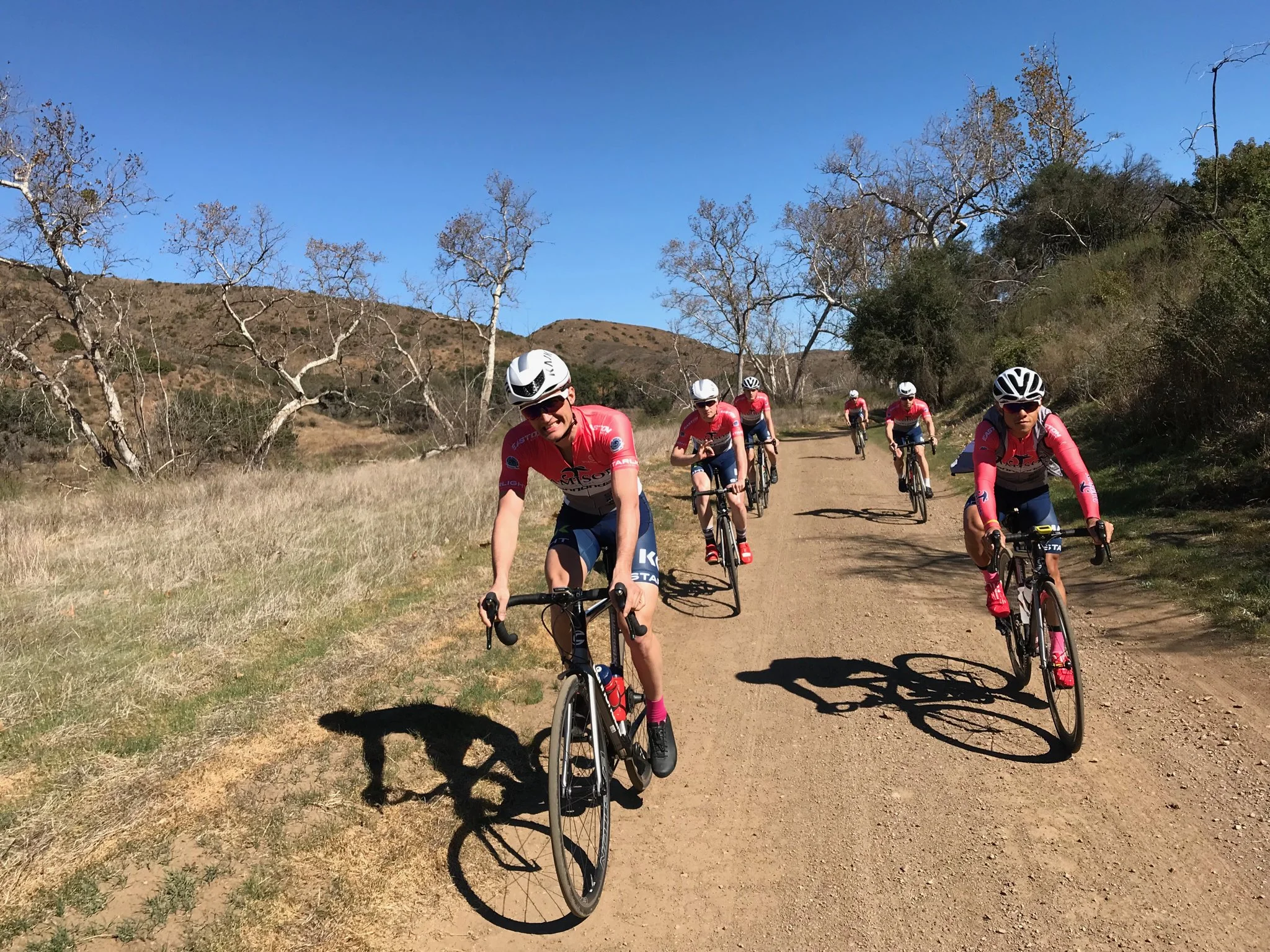 Jamison-Cannondale riders find a patch of gravel. Their Pro+ Bibs use dyed blue lycra for the mid panels. We printed the sides in the same blue using our new sublimation process that keeps the color true under compression.