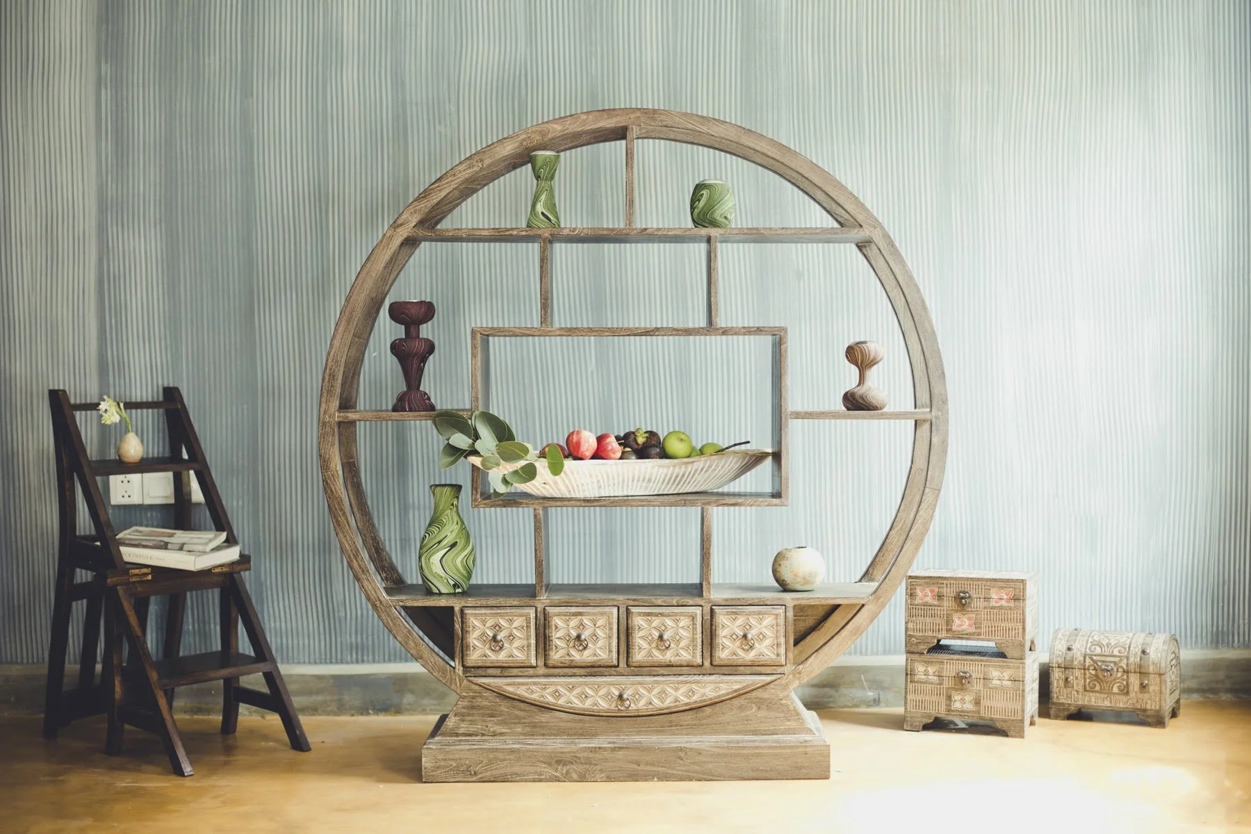 Wishing Wheel display unit with five drawers; ladder chair (converts from chair to ladder); hand carved boxes; boat bowl; sand & glass candle holders.