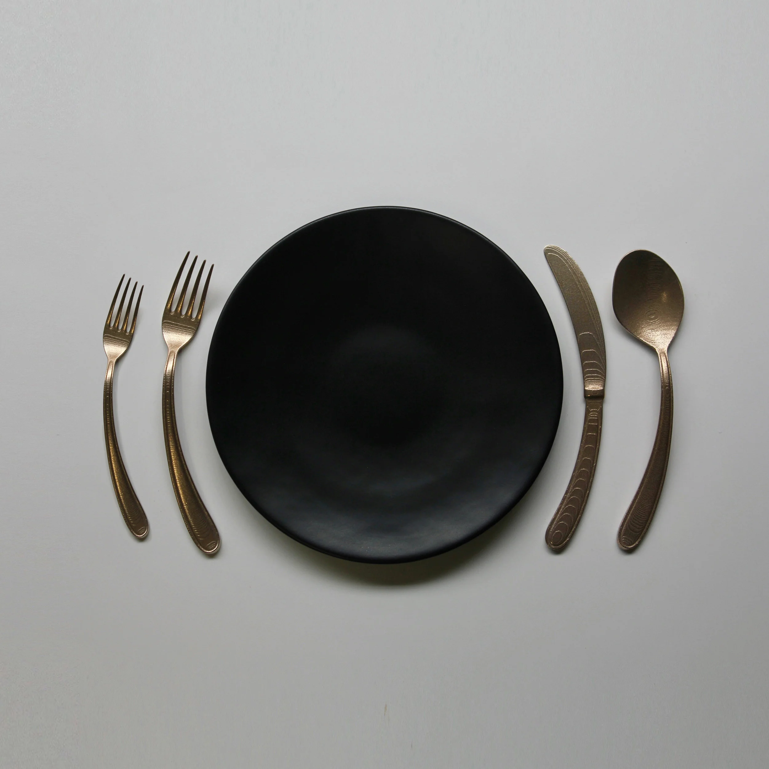 Curved Flatware
