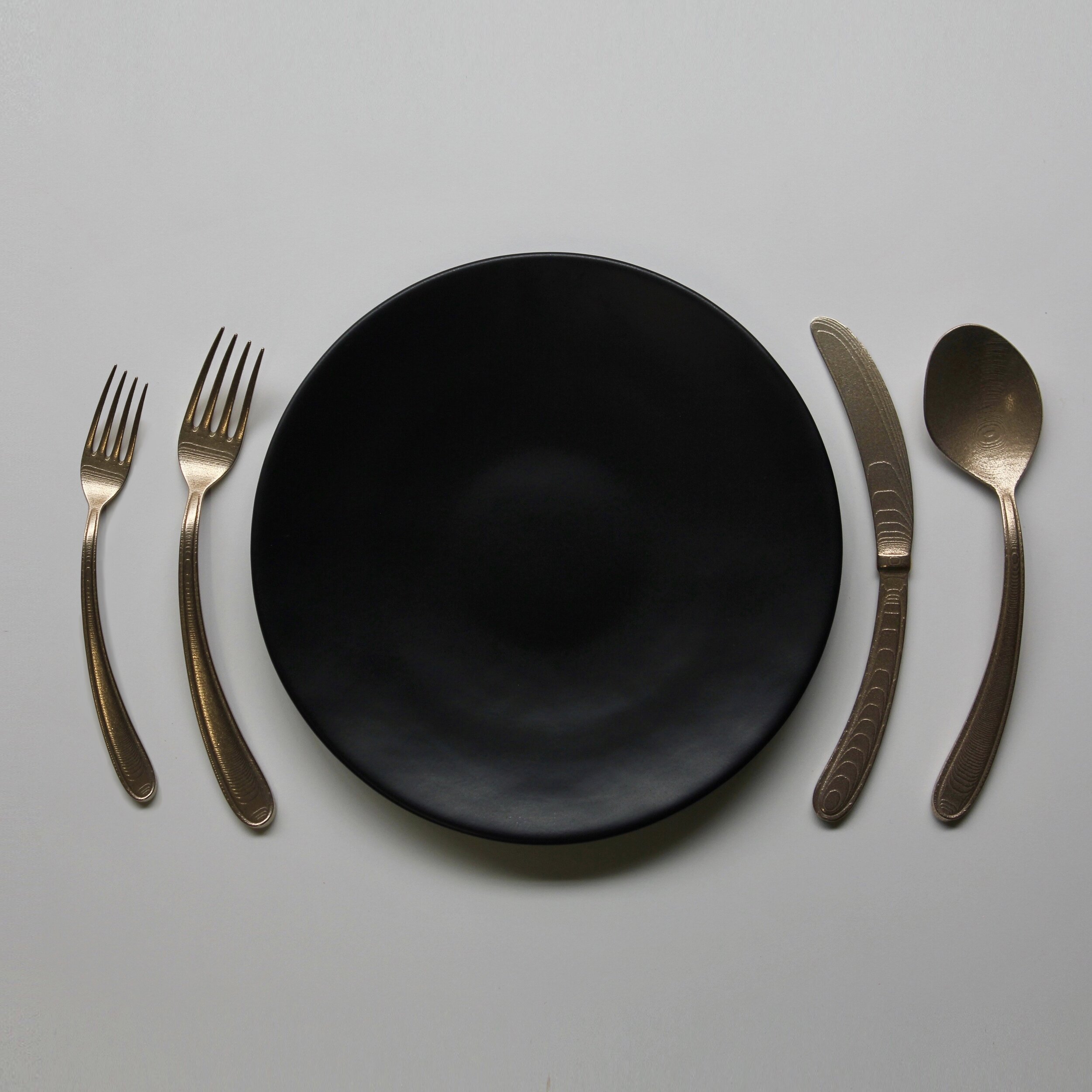 Curved Flatware