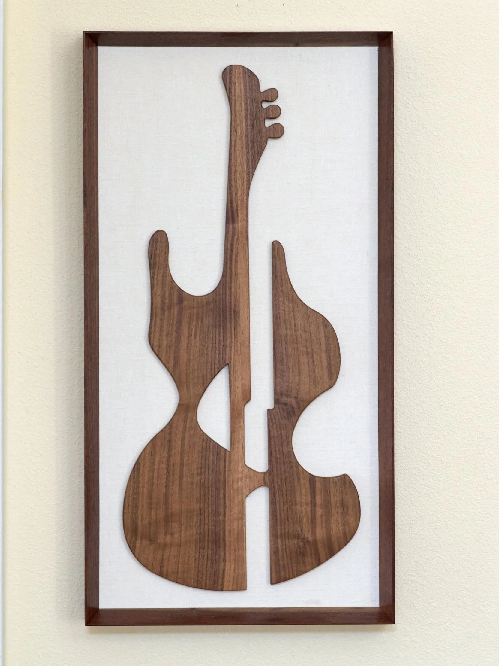Modernist guitar silhouette mounted on linen