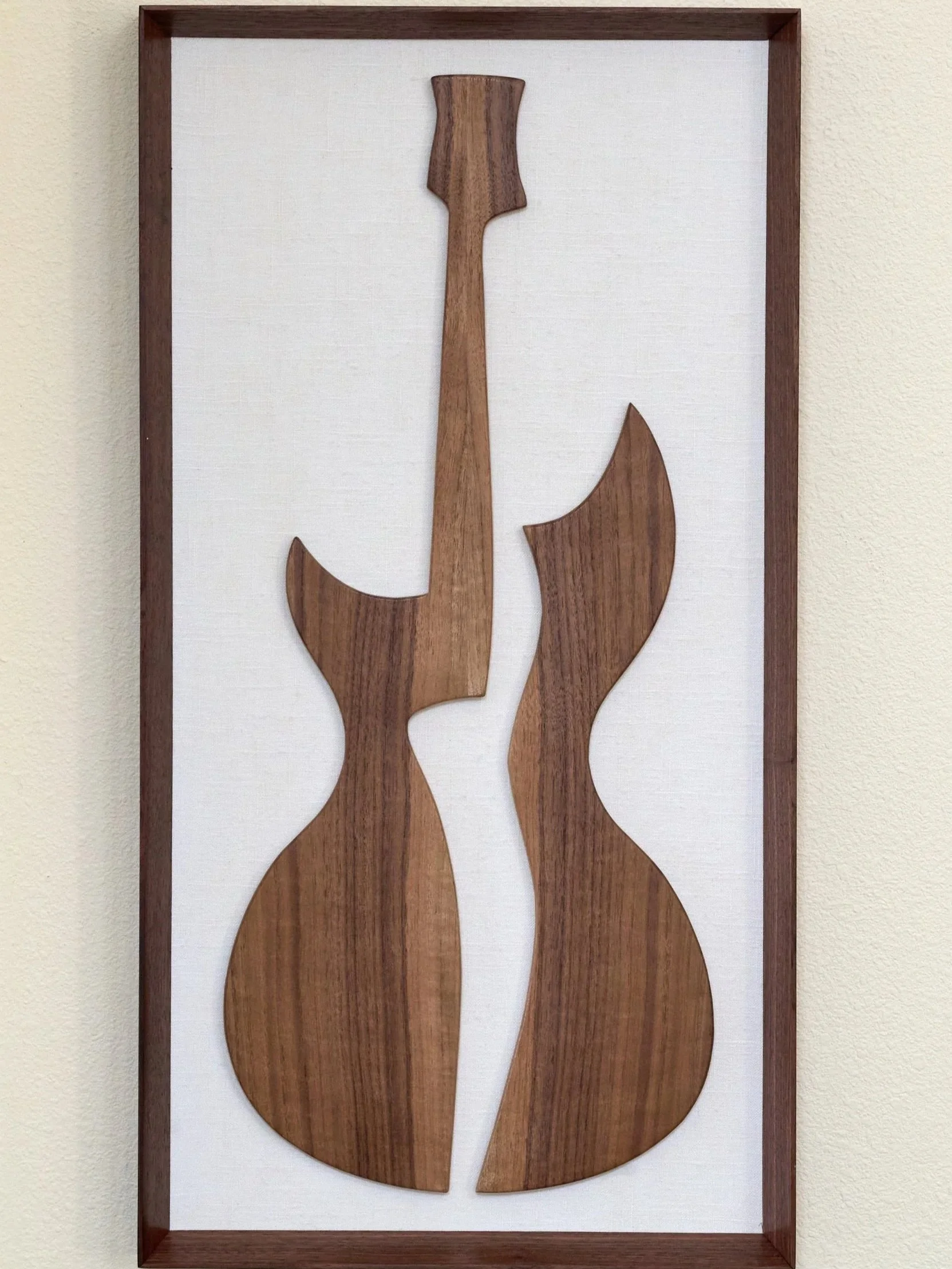 Modernist guitar silhouette mounted on linen