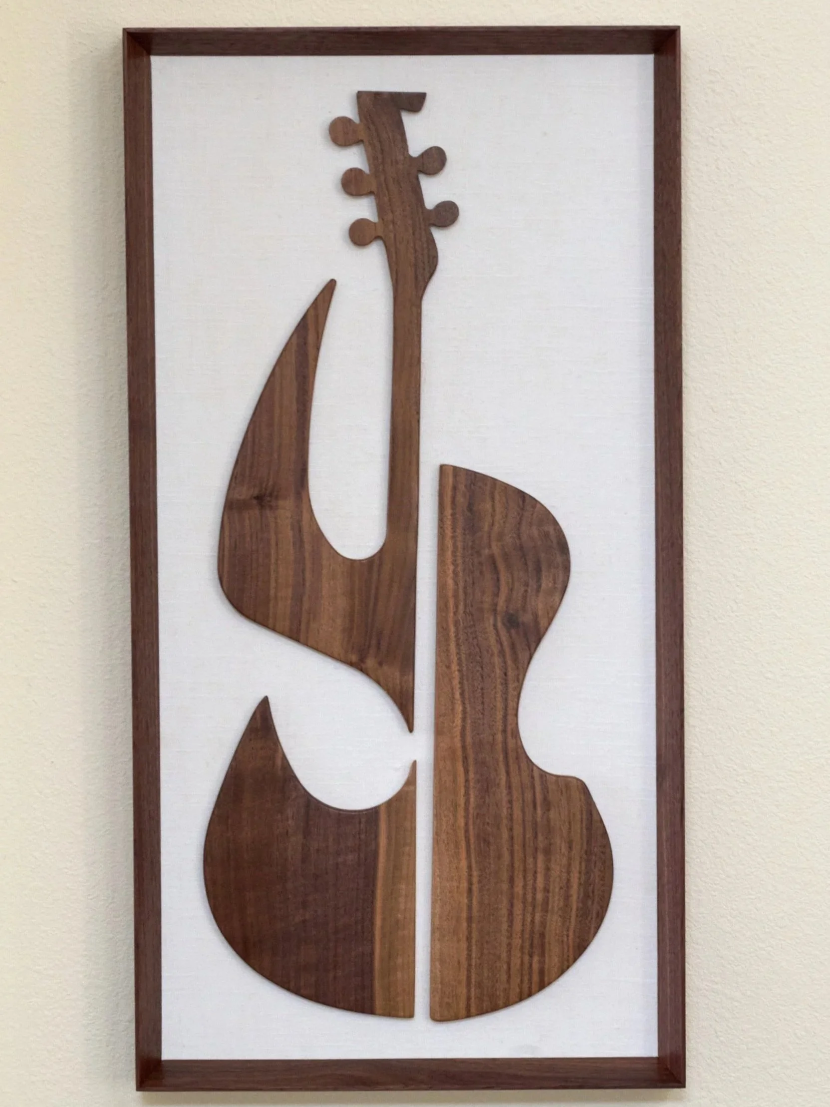 Modernist guitar silhouette mounted on linen
