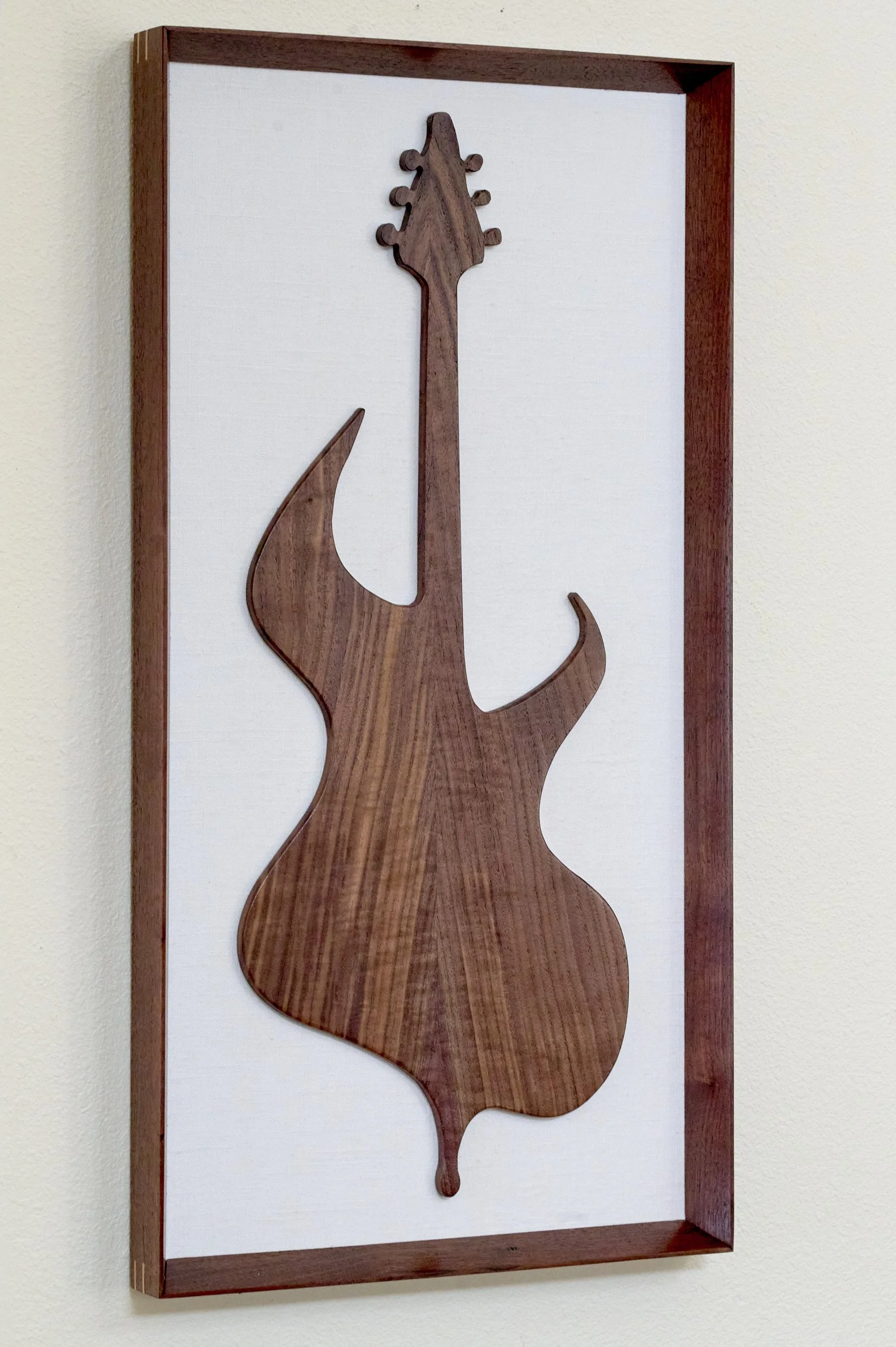 Modernist guitar silhouette mounted on linen