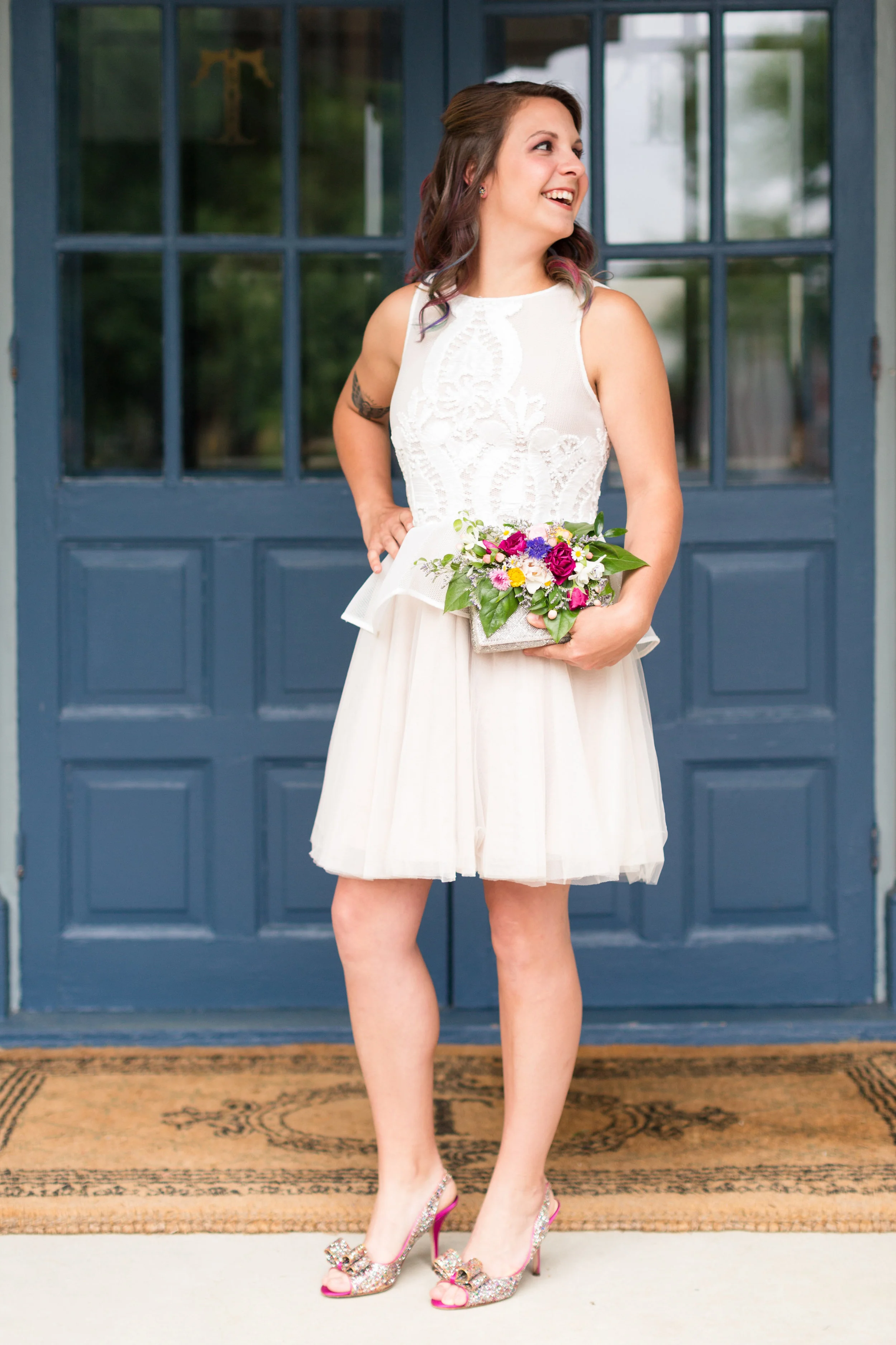 Not only am I dying over the clutch AND the dress, but those SHOES!!! Hair stylist Angela Bozman, owner of Hair Candy LLC, actually wore these for her own rainbow-themed wedding!