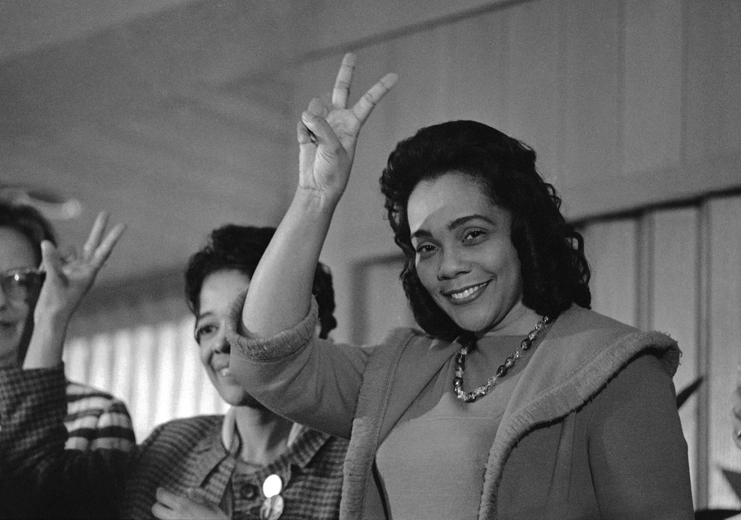 PAGE 126: A FEW MONTHS AFTER HER HUSBAND'S DEATH, CORETTA SCOTT KING ANNOUNCED HER PLANS TO ESTABLISH THE MARTIN LUTHER KING JR. CENTER FOR NONVIOLENT SOCIAL CHANGE IN ATLANTA. IN 1983. THE FEDERAL HOLIDAY HONORING DR. KING WAS SIGNED INTO LAW BY PRESIDENT RONALD REGAN (PERMISSION OF THE ASSOCIATED PRESS).