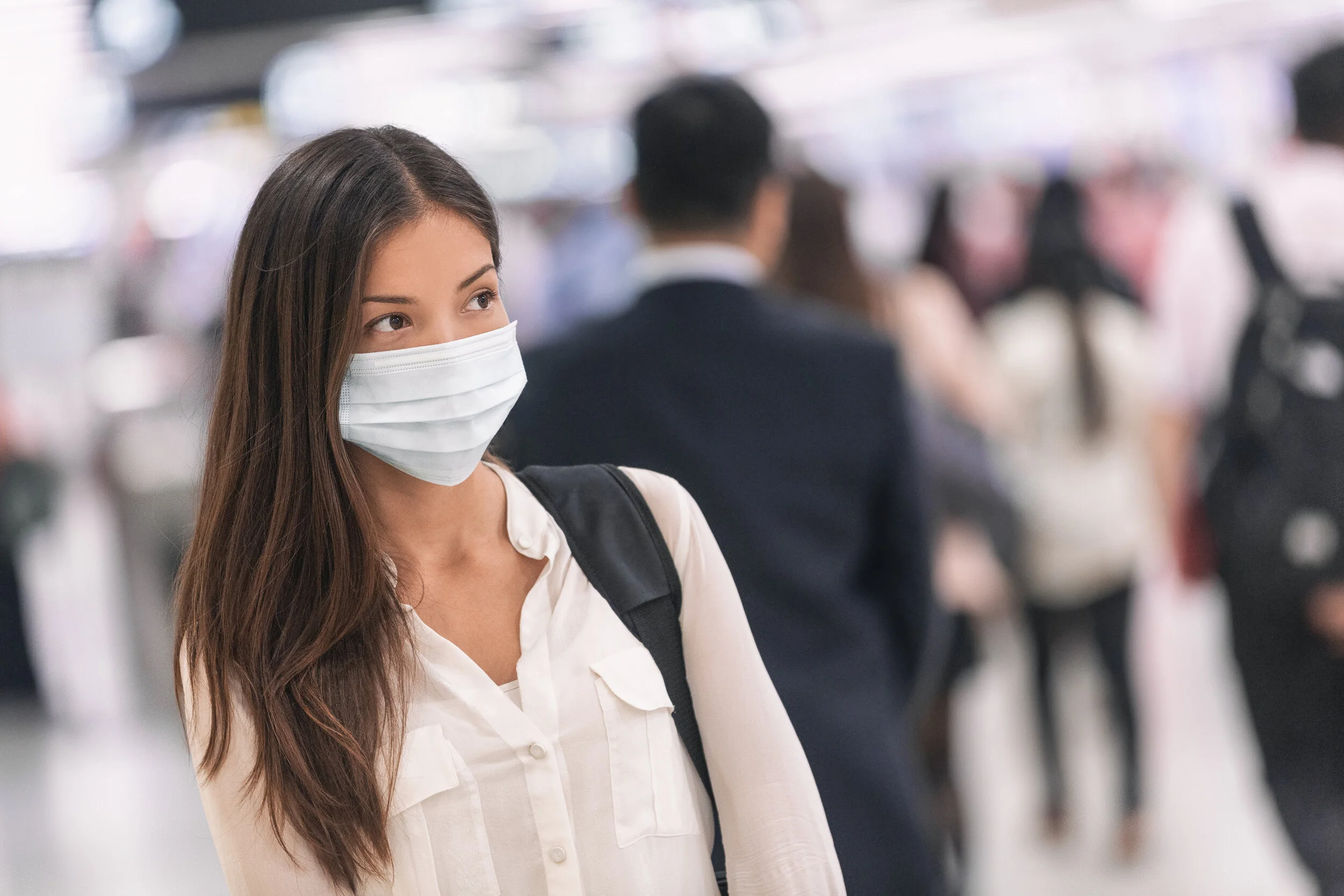 bigstock-Virus-mask-Asian-woman-travel--347841352.jpg